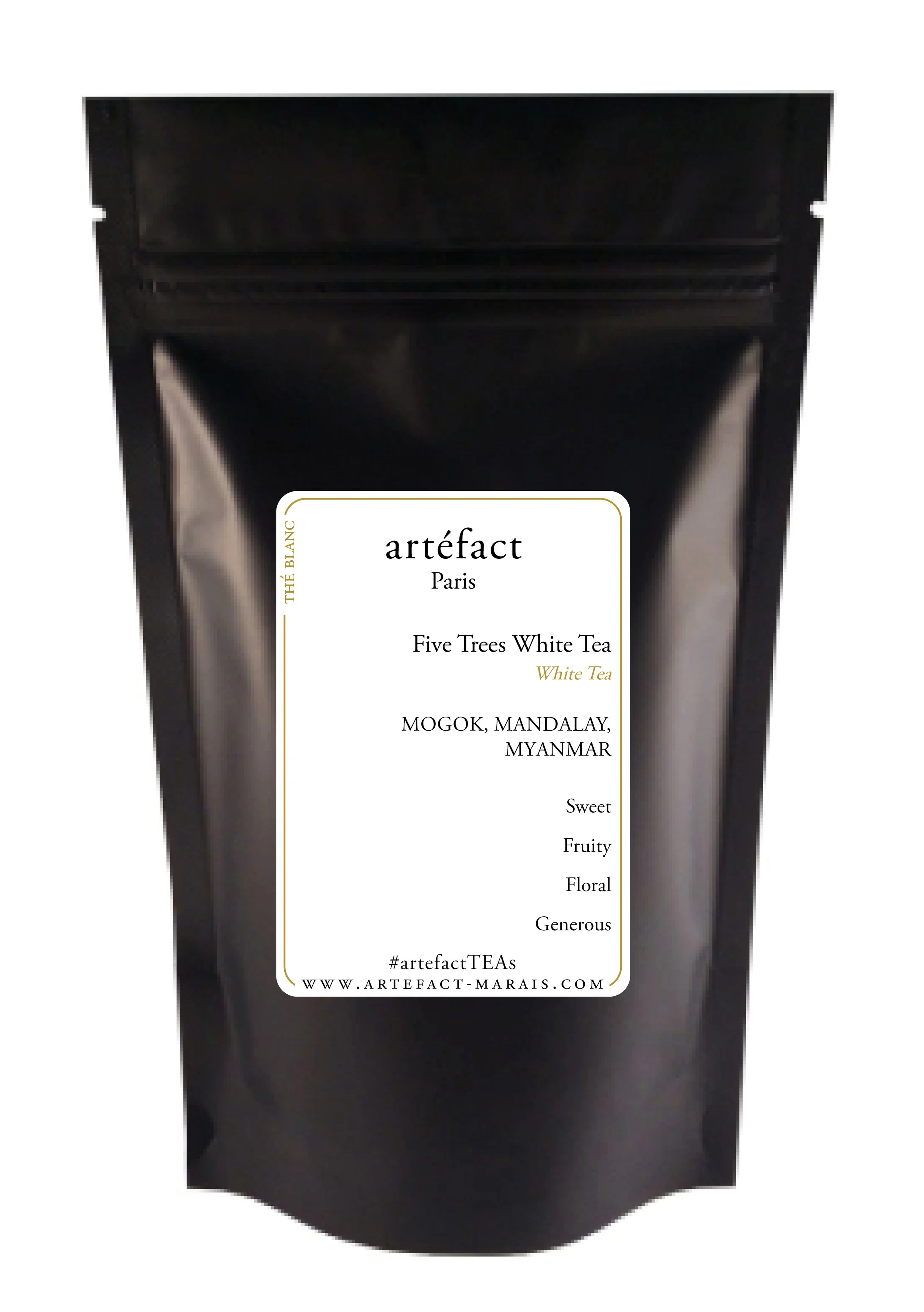Black bag of Artefact five trees white tea from Myanmar, with a label emphasizing that it is a white tea with fruity and floral notes, sourced from Mogok, Mandalay, Myanmar.