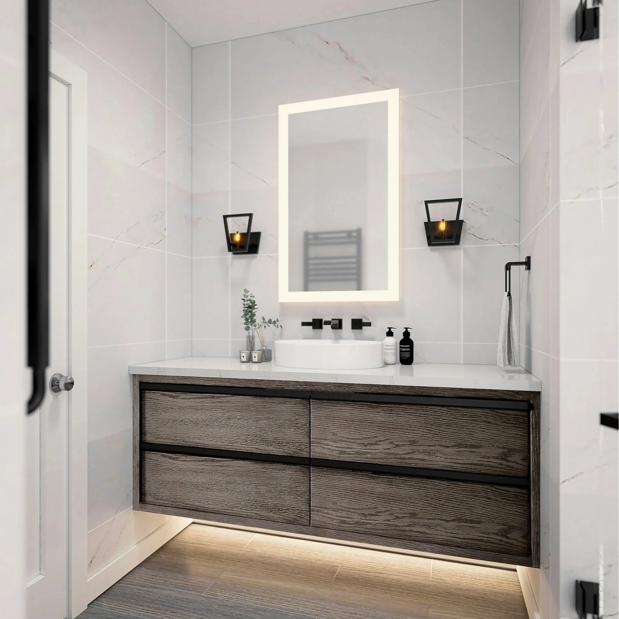 Modern bathroom with a white marble wall, black wall sconces, a backlit mirror, and a wooden vanity with a white countertop and a vessel sink.