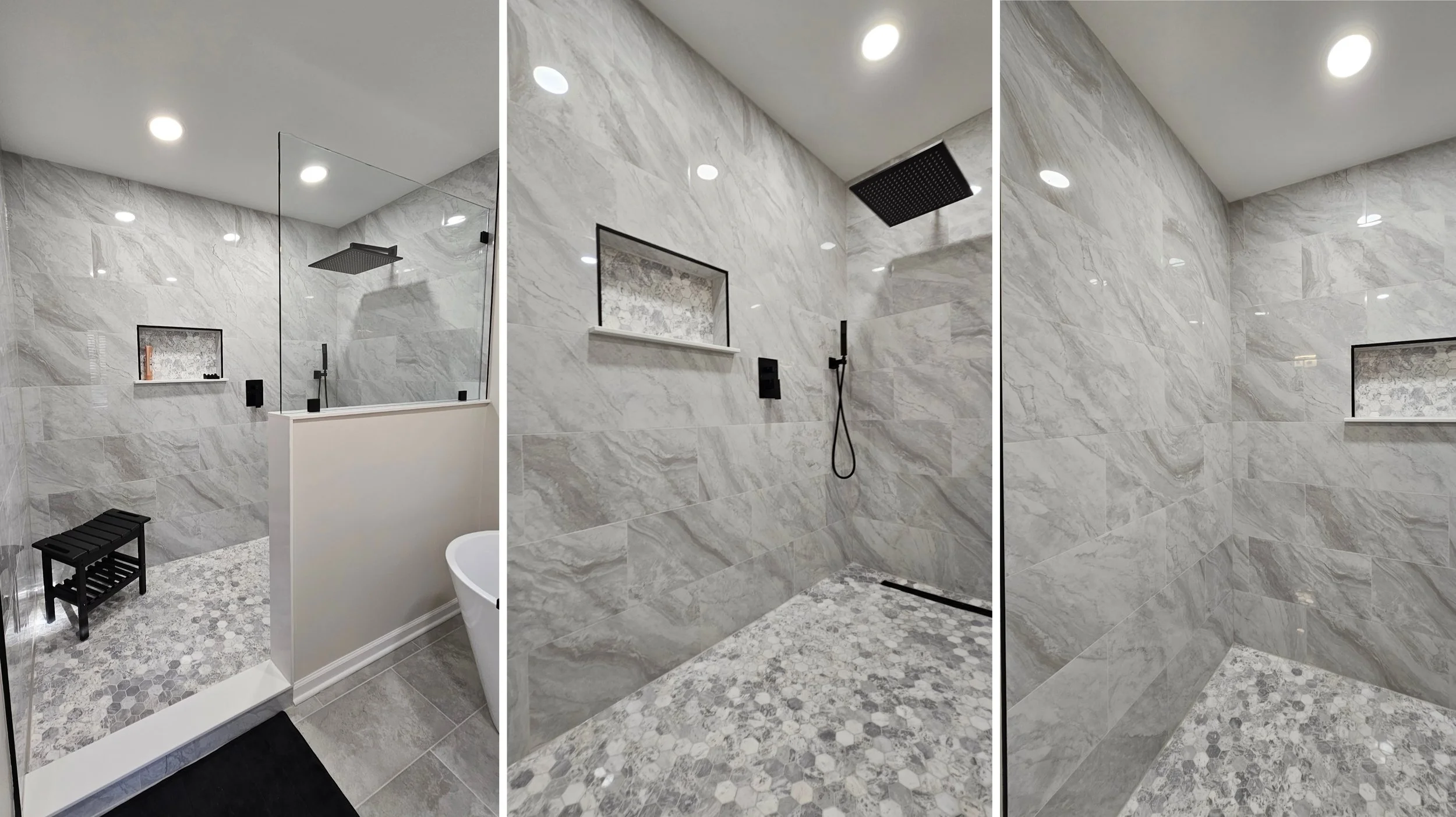 Modern bathroom with a walk-in shower featuring a black rainfall showerhead, gray marbled wall tiles, pebble floor tiles, and a built-in niche with toiletries.