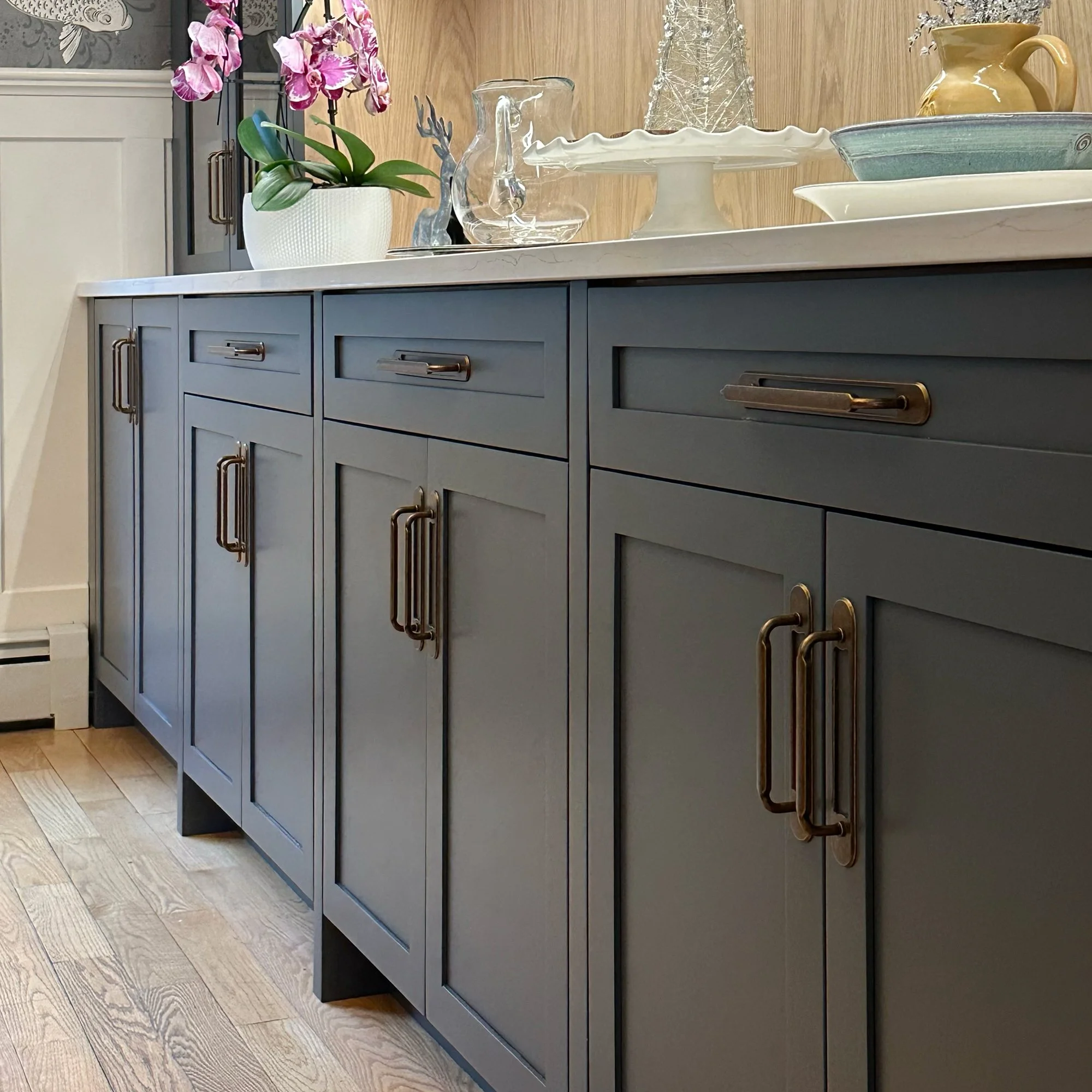 Custom dining room built-in with integrated storage, display shelving, and serving area in Newburyport, Massachusetts.