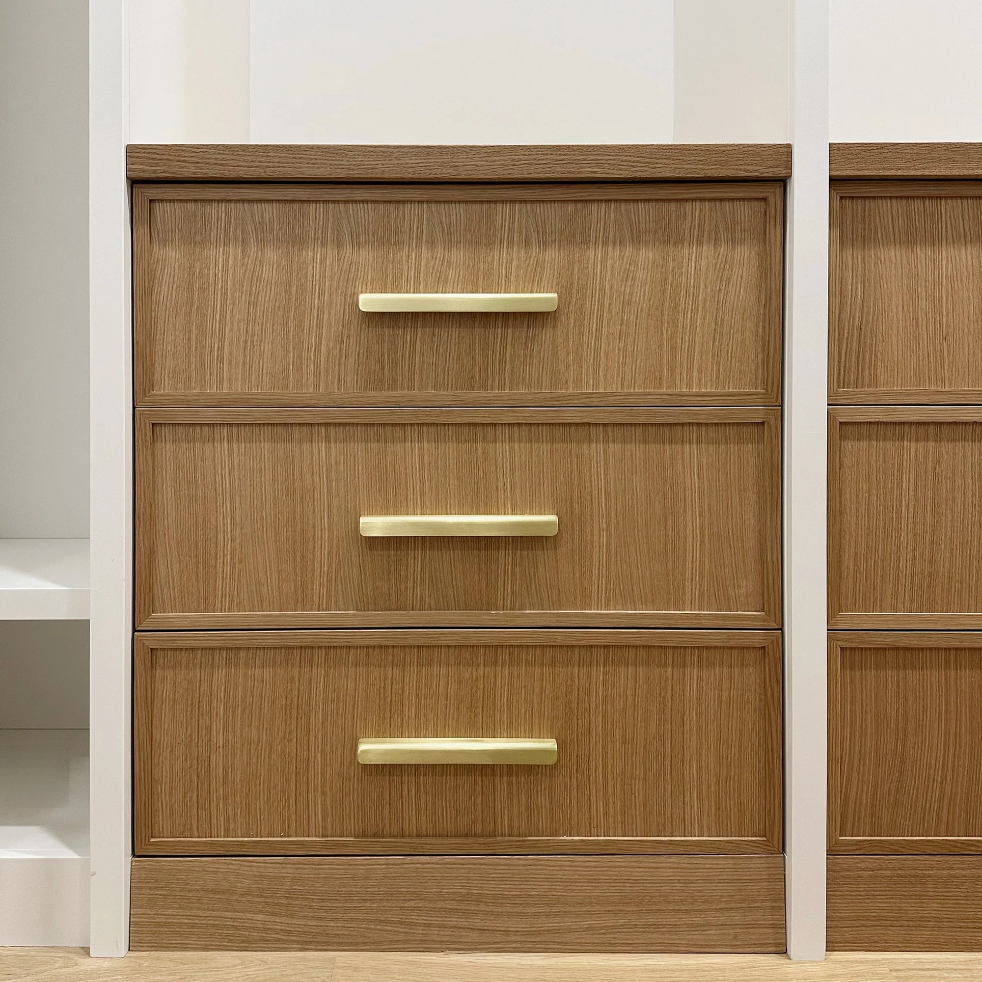 Custom walk-in closet cabinetry designed and handcrafted for a home in Newton, Massachusetts.