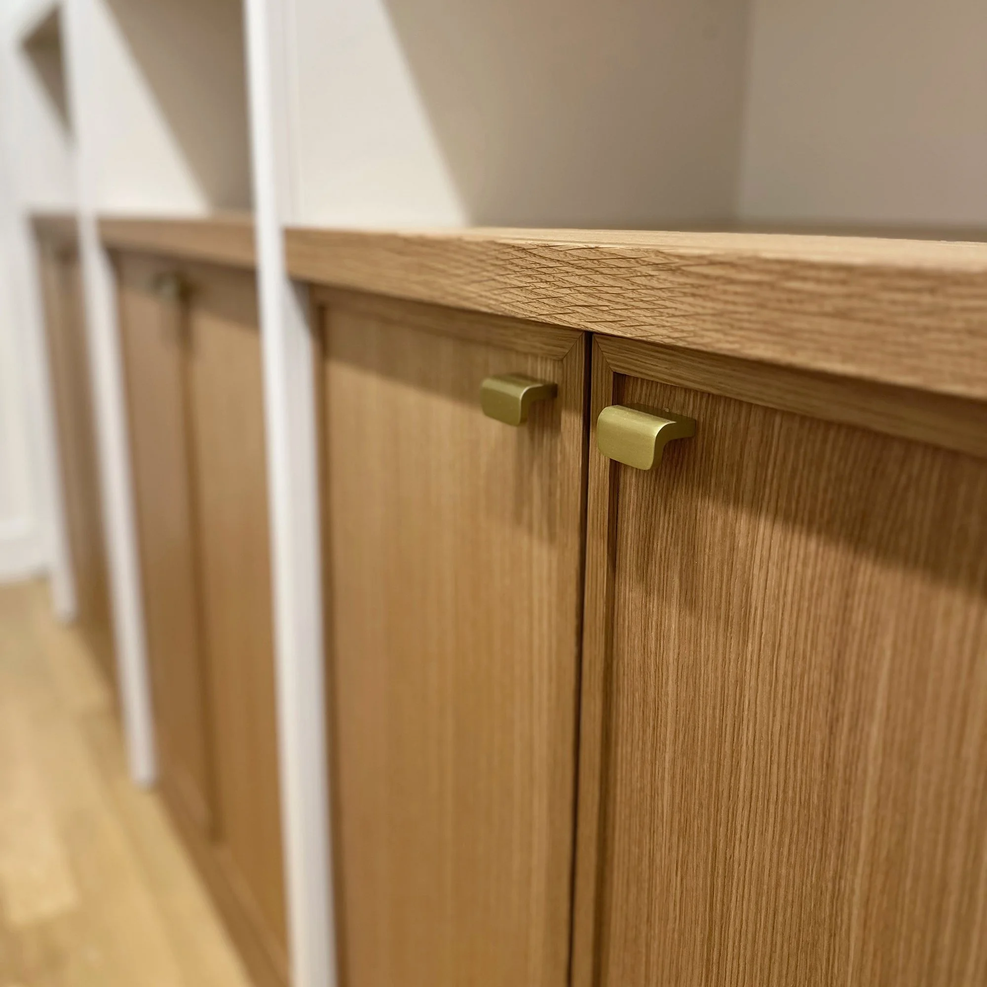 Custom walk-in closet cabinetry designed and handcrafted for a home in Newton, Massachusetts.