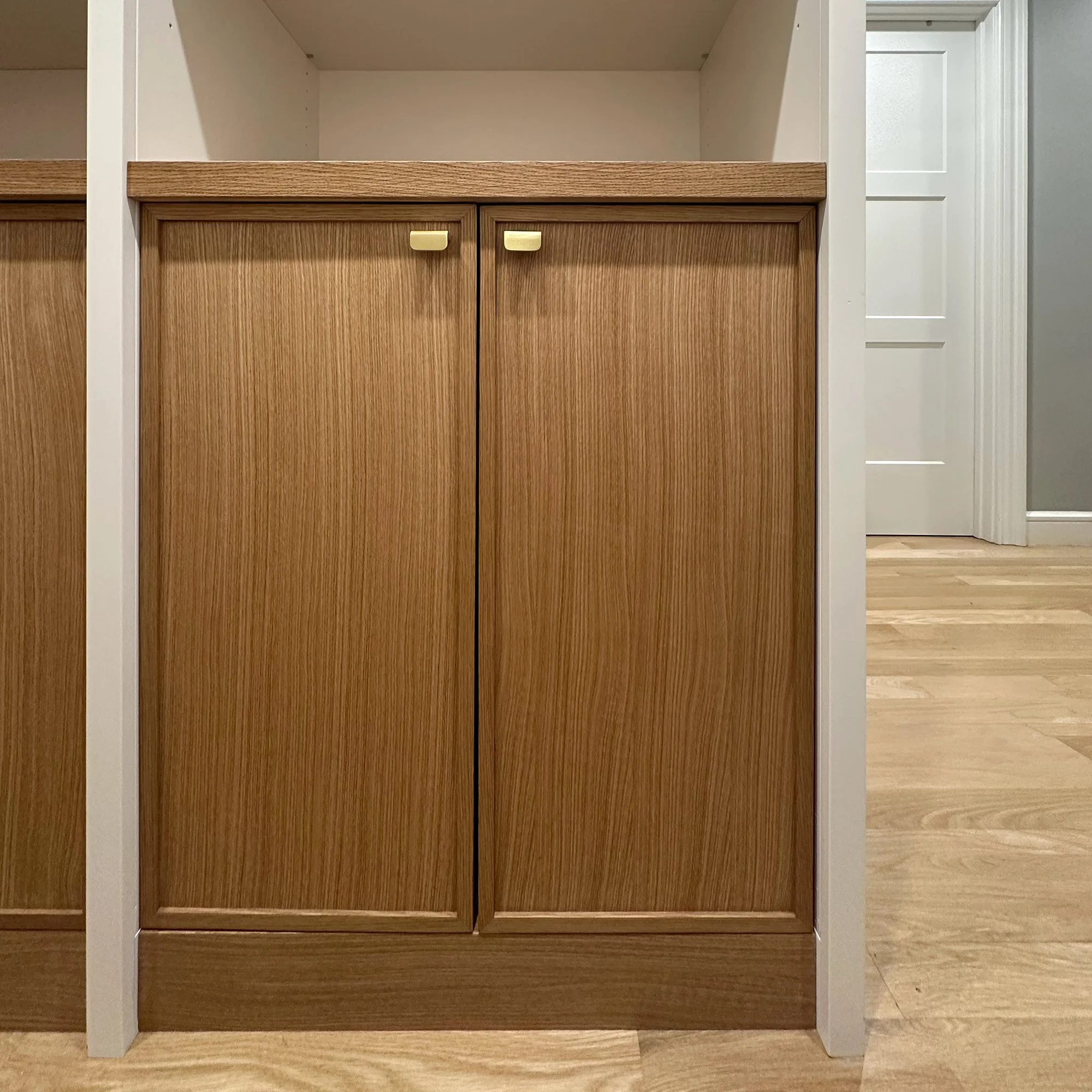 Custom walk-in closet cabinetry designed and handcrafted for a home in Newton, Massachusetts.