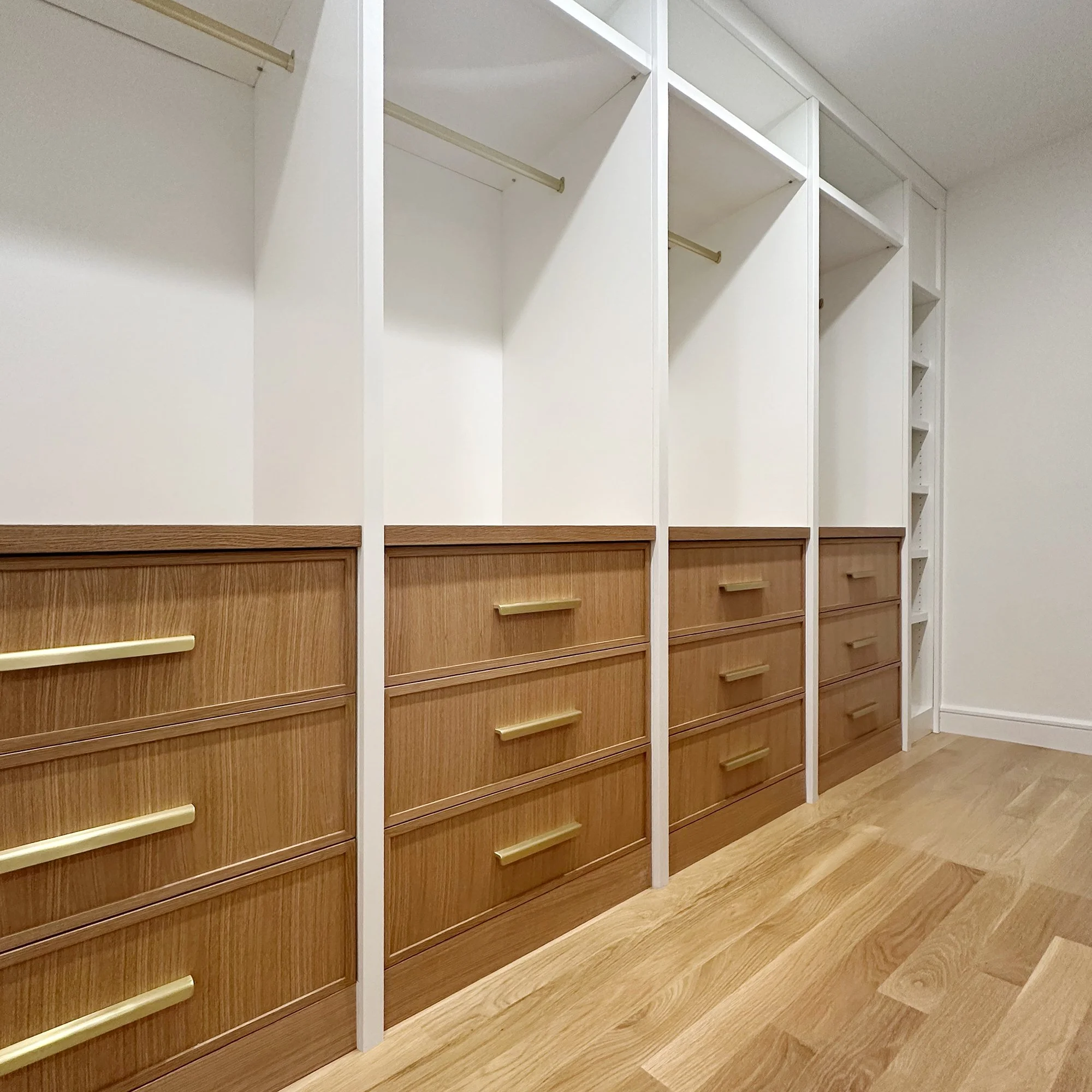 Custom walk-in closet cabinetry designed and handcrafted for a home in Newton, Massachusetts.