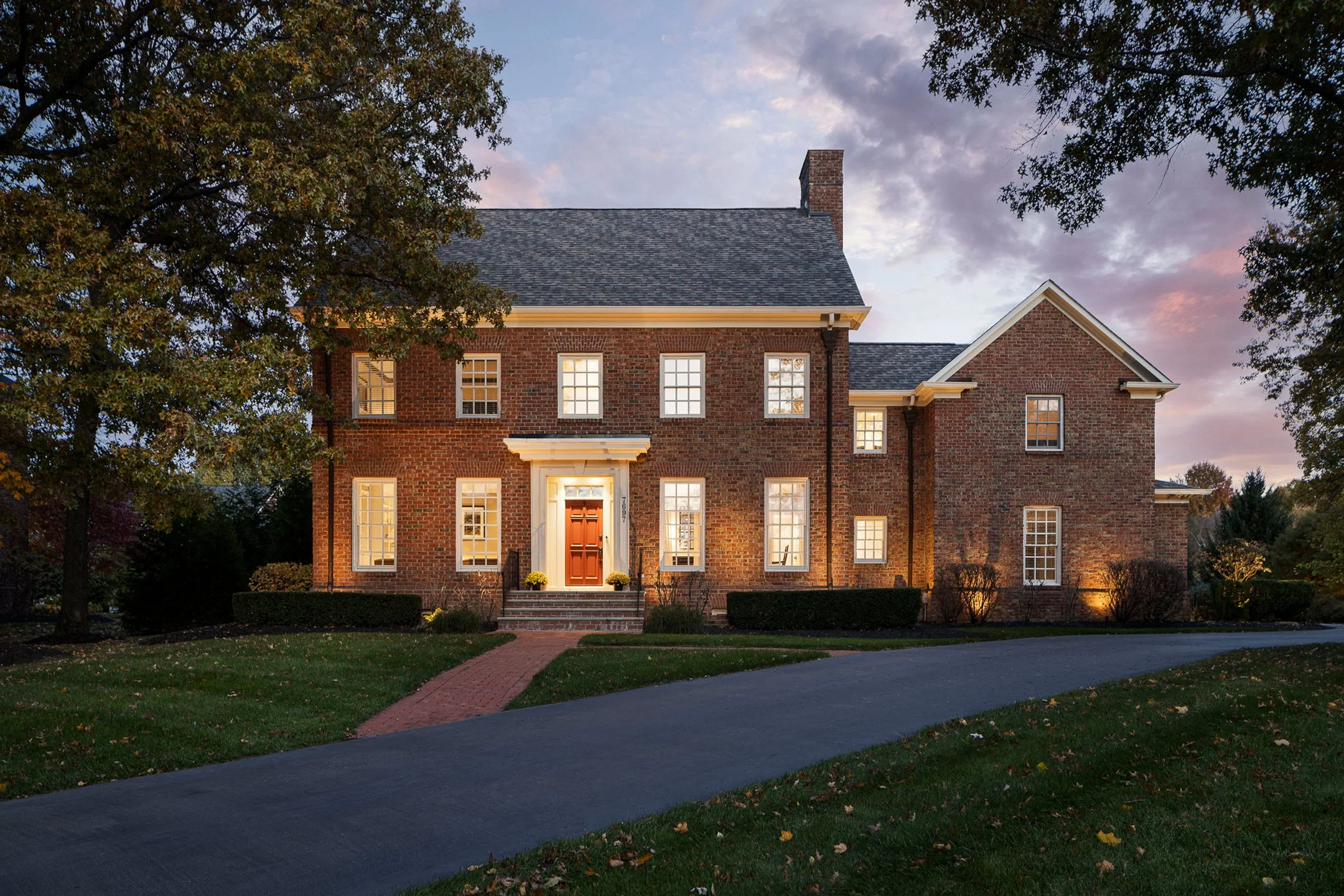 Luxury twilight exterior listing photography at 7697 Somerly Ct, New Albany, OH by Drew Lehman Photography.