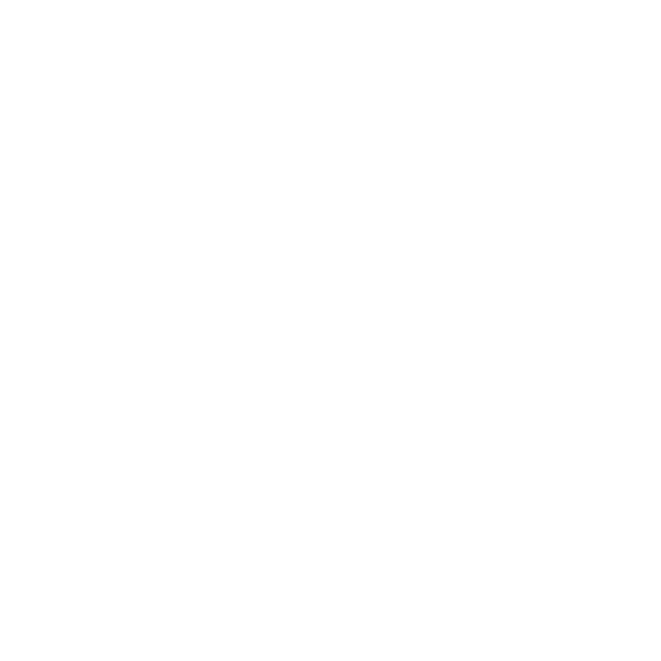 A white cat sleeping on a gray blanket in a cozy room.