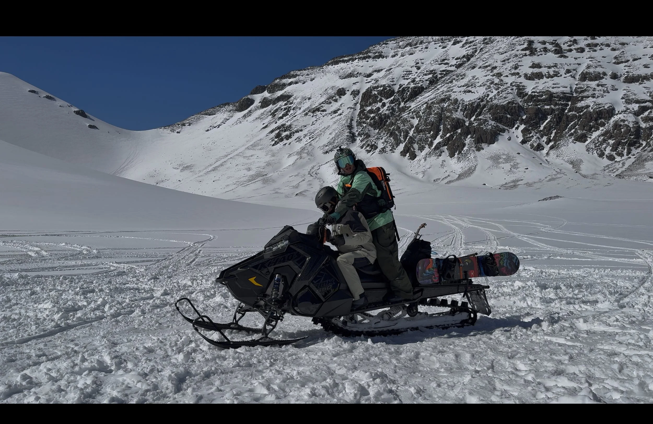 snowmobile with client.jpg