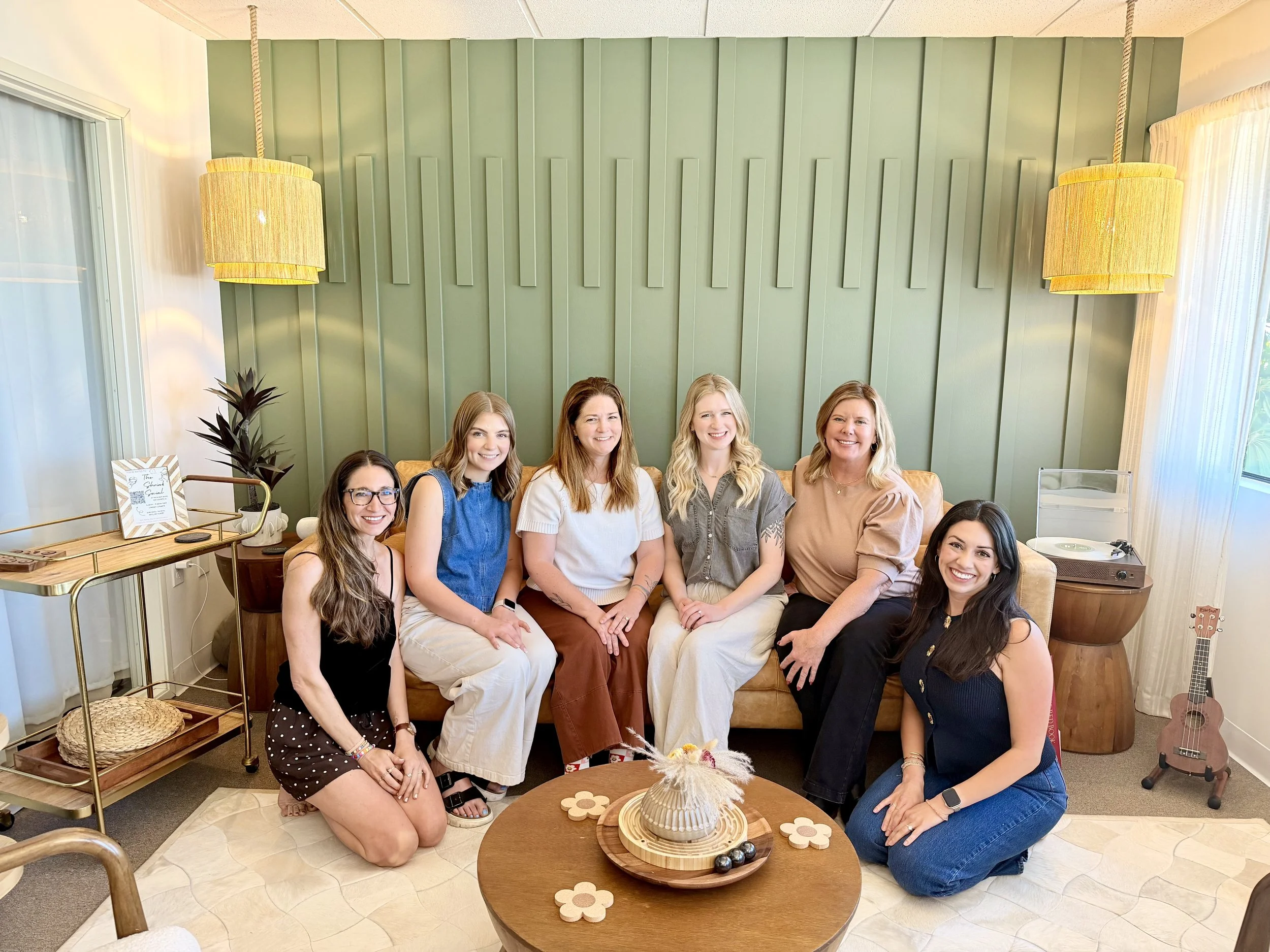 therapist women smiling on couch