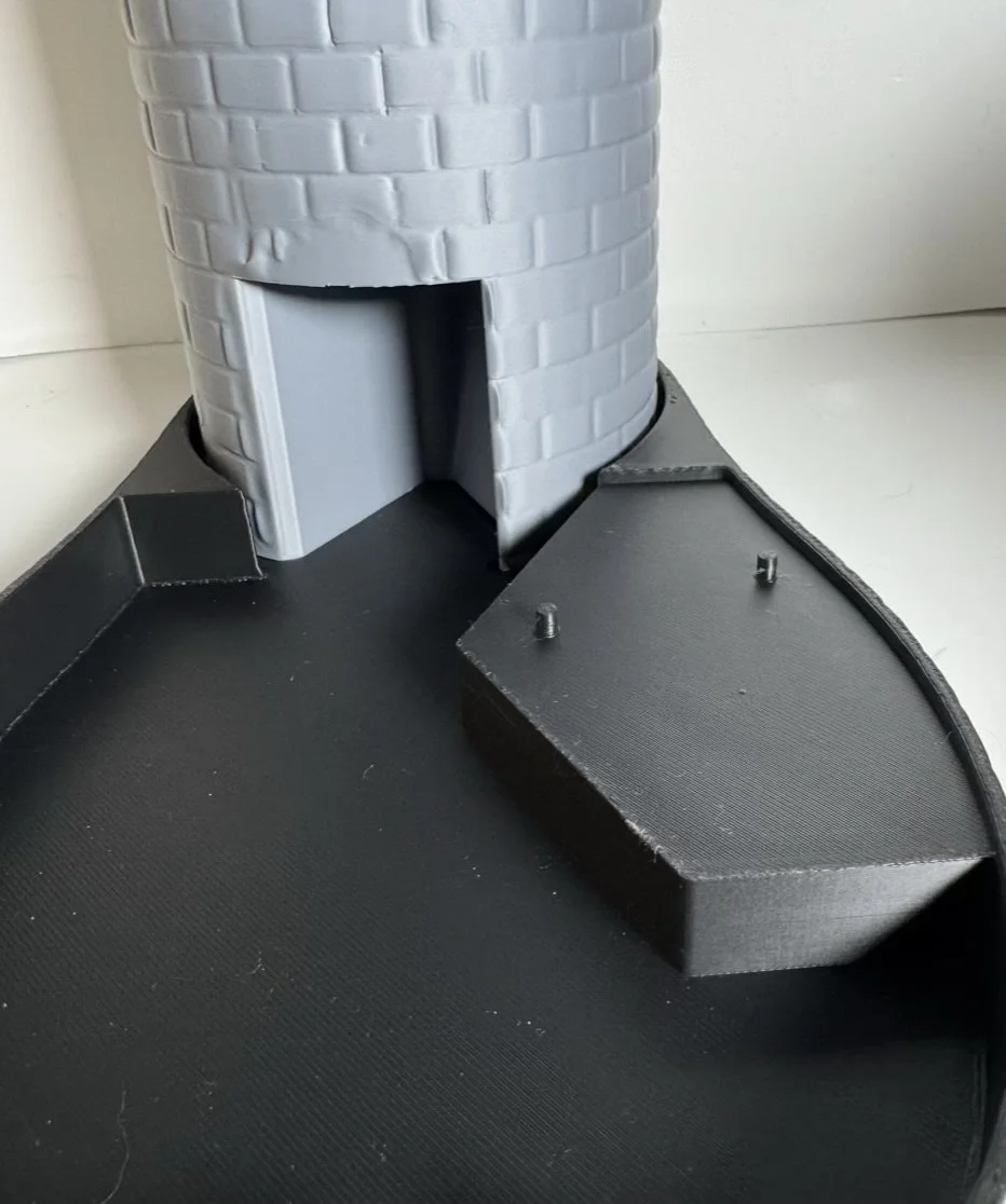 Dice tower and Base in two tones Showing 2 pegs for action figure support