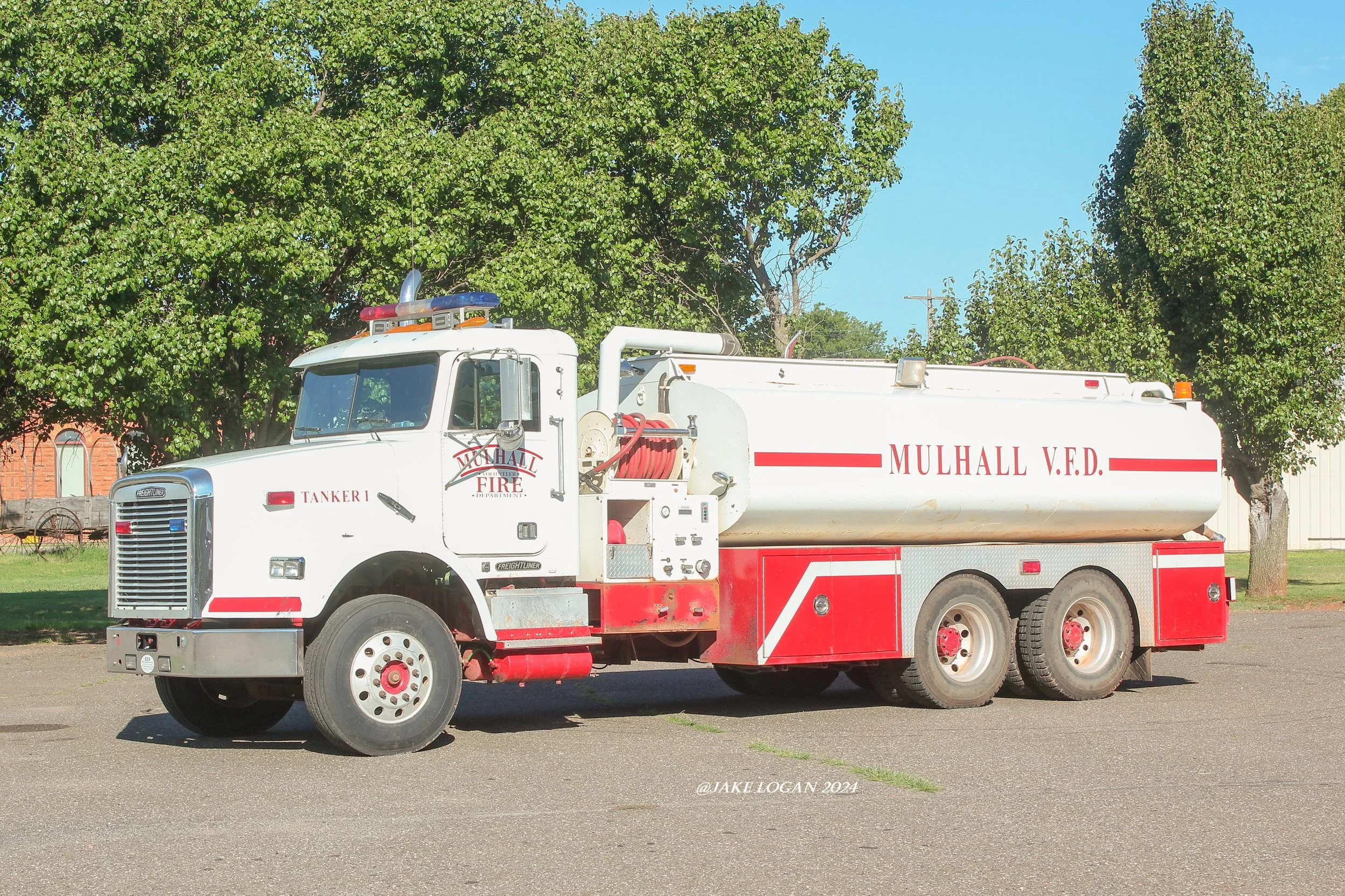 Tanker 1 - 1996 Freightliner/2003 Emergency Equipment Services (OKC) - 300 Waterous/4000 Tank - Diesel/Manual
 
 
Purchased in 2003, Tanker 1 mainly acts as the departments rural tanker.