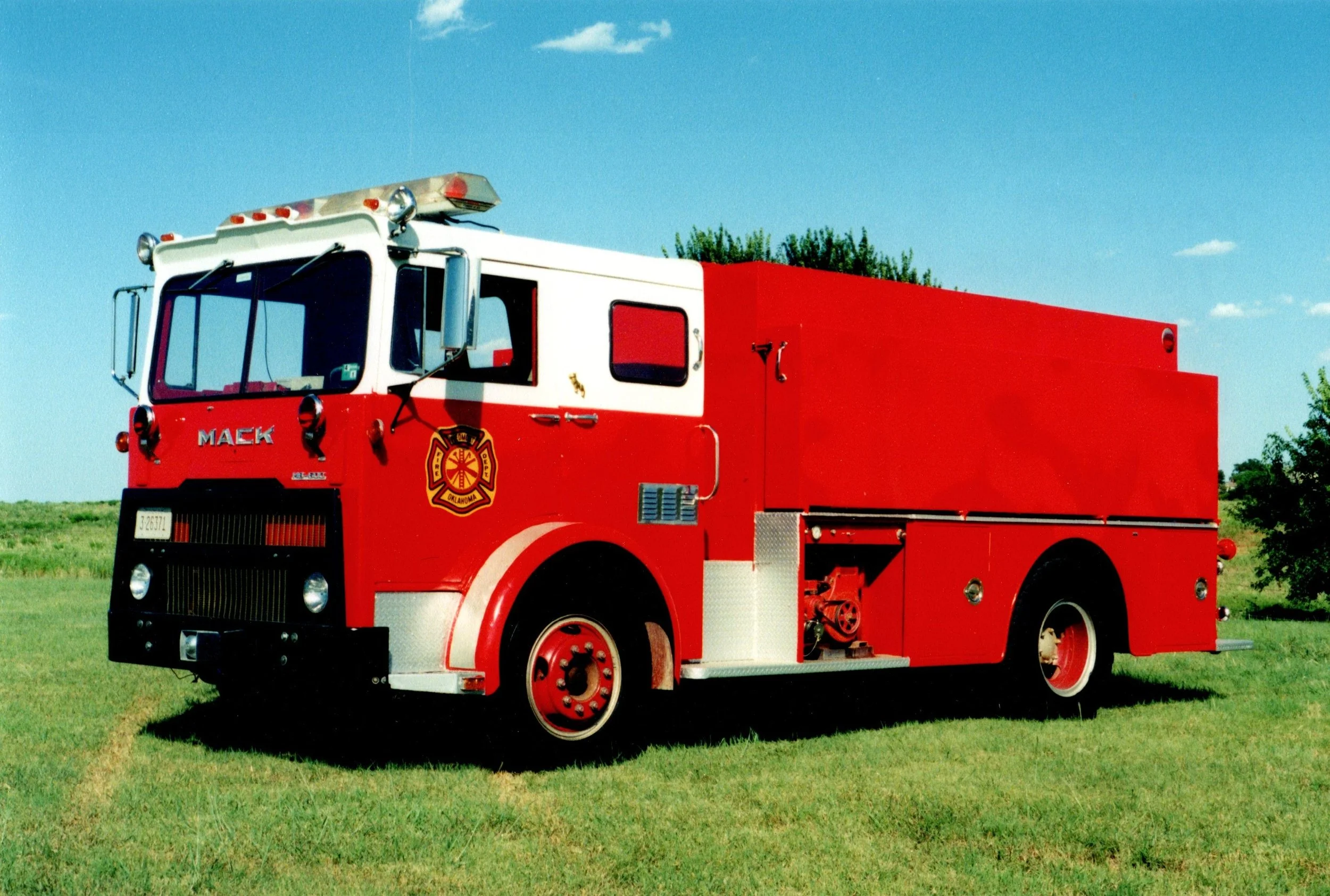 Tanker 2 - 1975 Mack/Howe 14431-H/PFD - 150/2000 -DA ex-Okla. City
 
 
Tanker 2 was originally a pumper for Oklahoma City. It then shortly served as a pumper for the PFD before being turned into a Tanker in the late 90's. This truck served until 2007