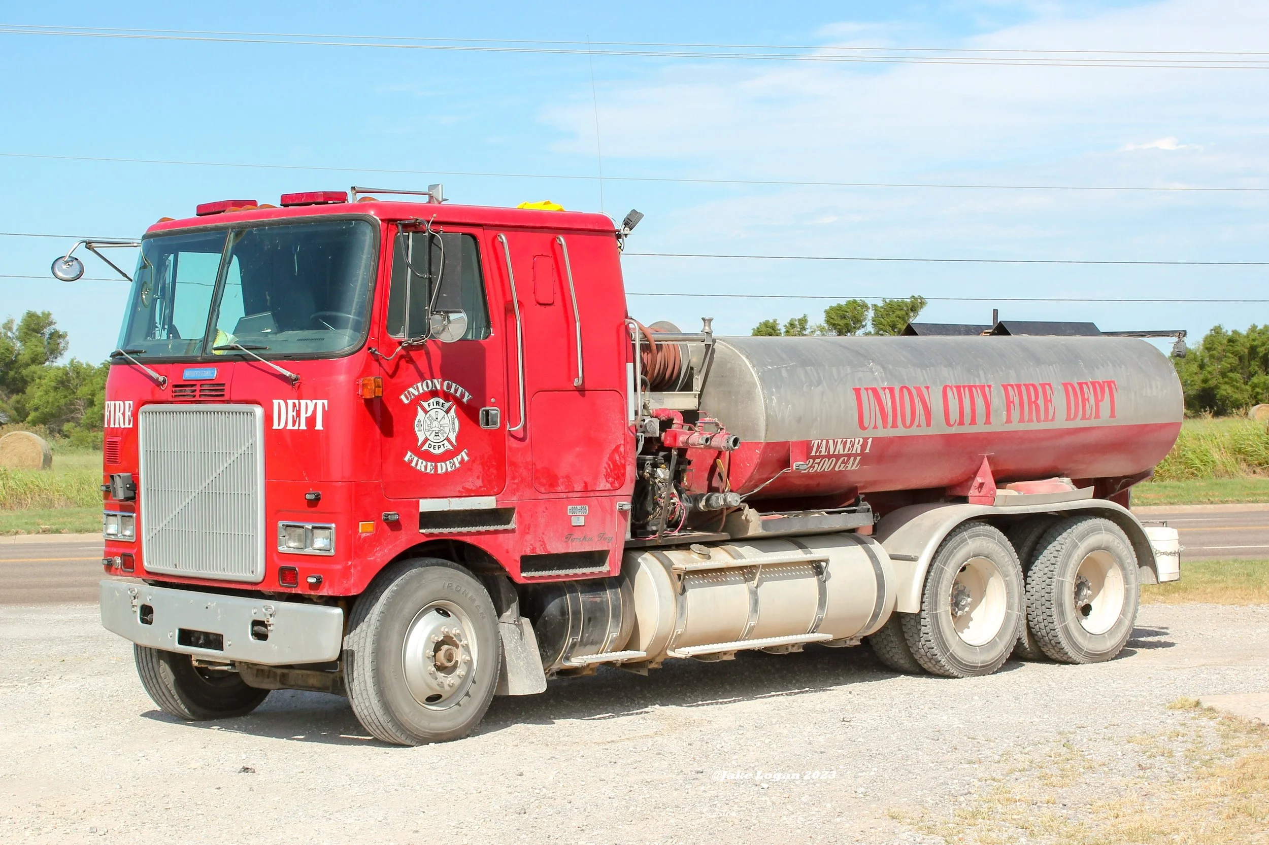 Tanker 1 - 1993 White-GMC/UCFD - 250/2500 - Diesel/Manual 
 
 
On the bottom corner of the cab, you can see a than blue line sticker with #800 & #805 on it. This is for Police Chief Rich Stephens and Lieutenant Brandon Owens, who both unfortunately l