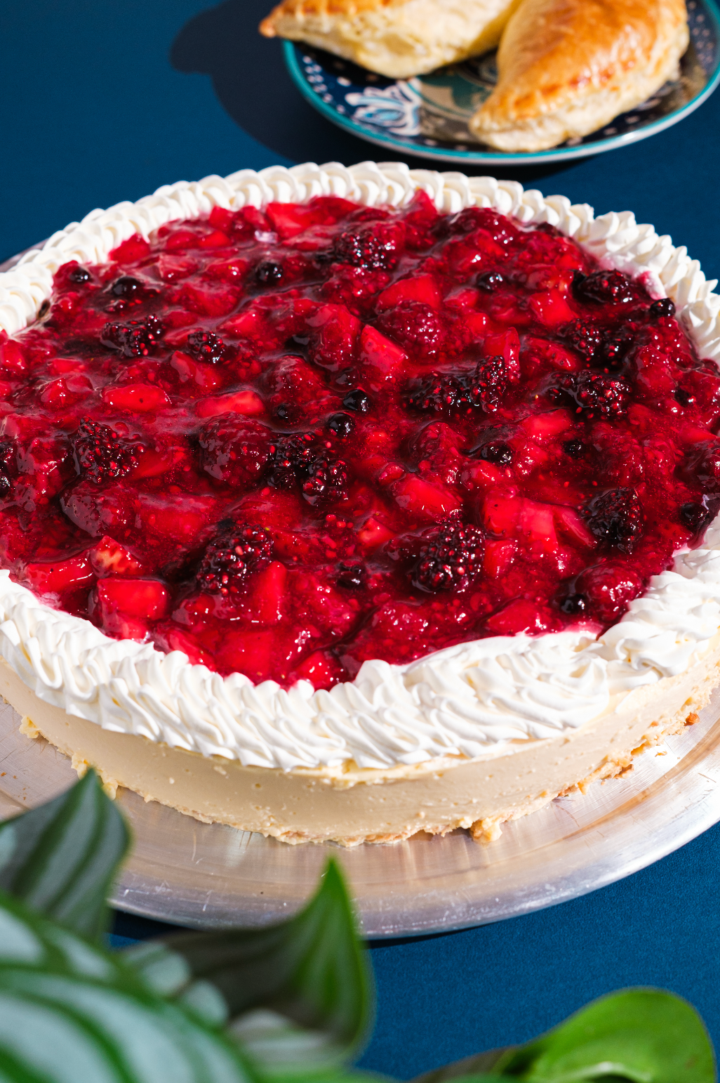 Cheesecake de Maracuyá con Frutos Rojos