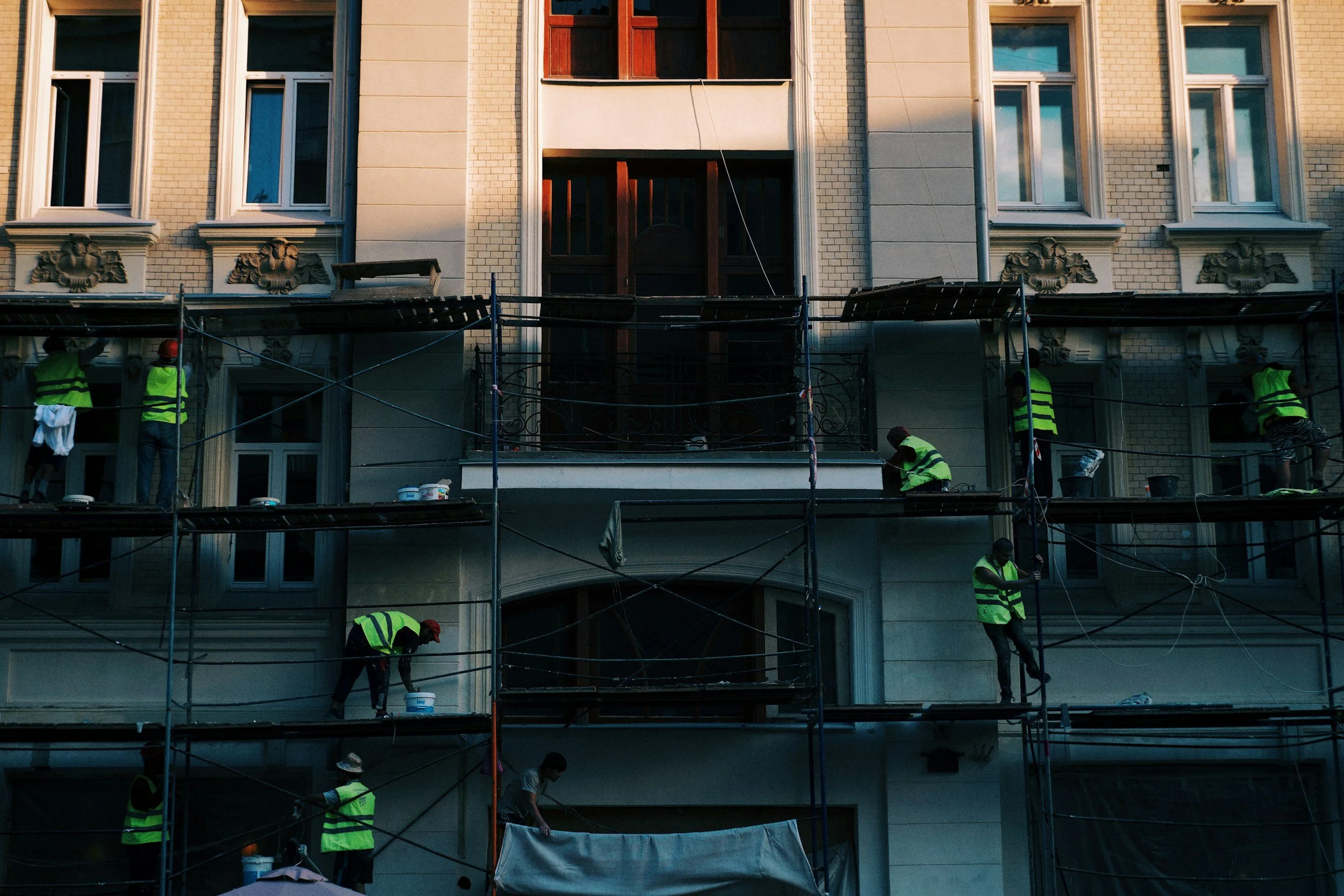 Construction workers on scaffolding