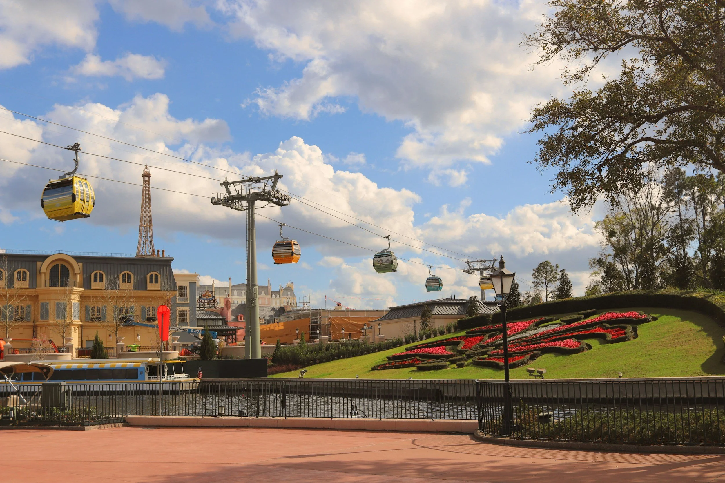 behind the scenes view of Epcot's France Pavilion at Disney World with the skyliner overhead