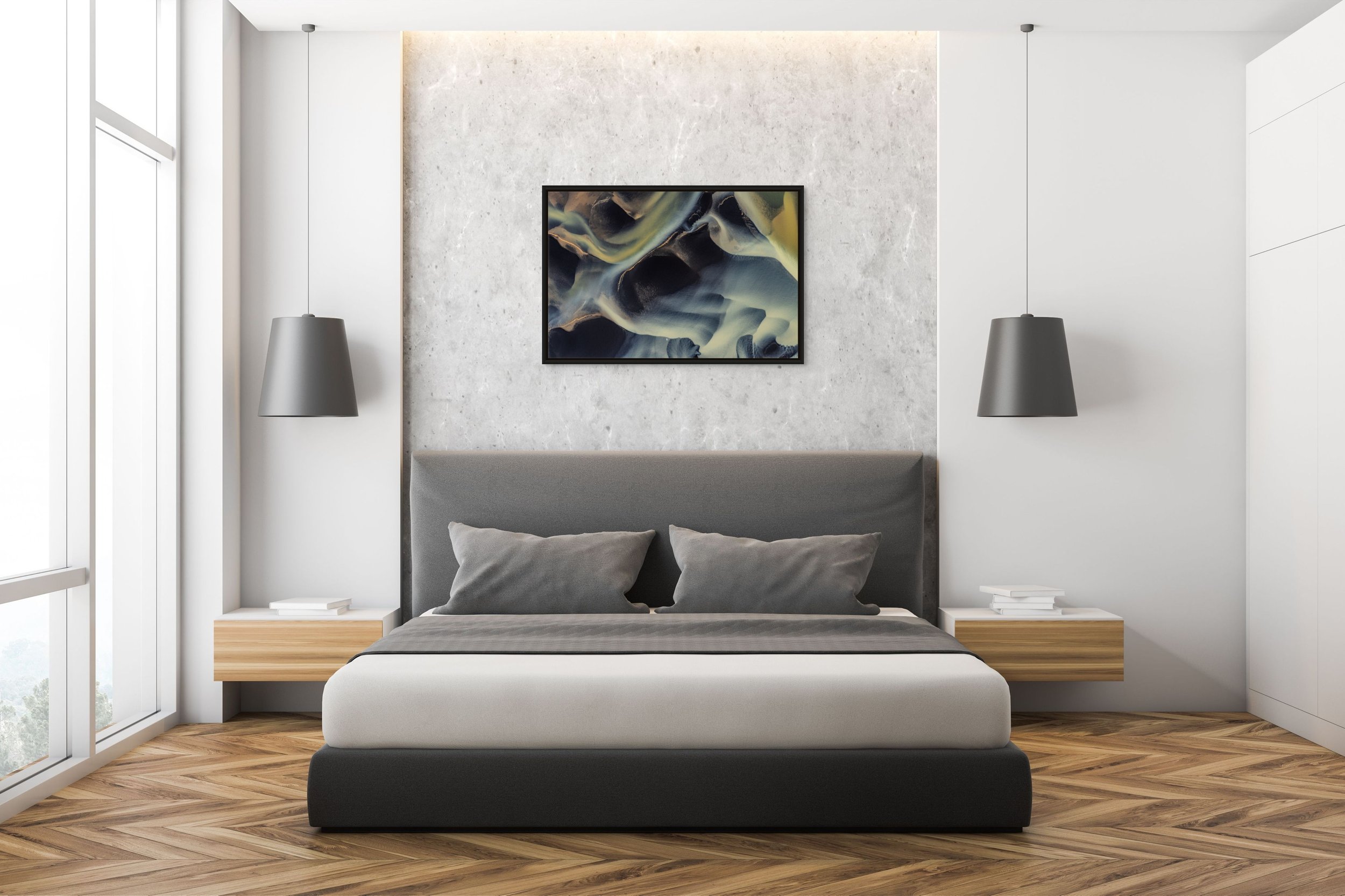 Framed in Black — River of Shadows in a moody bedroom with gray upholstered bed and pendant lights.