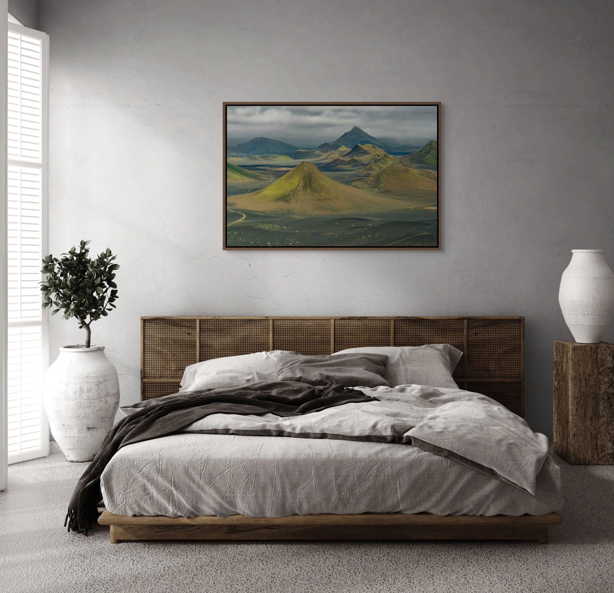 Where Earth Dreams in a floating Walnut frame, featured above a bed in a cozy bedroom with textured linens.