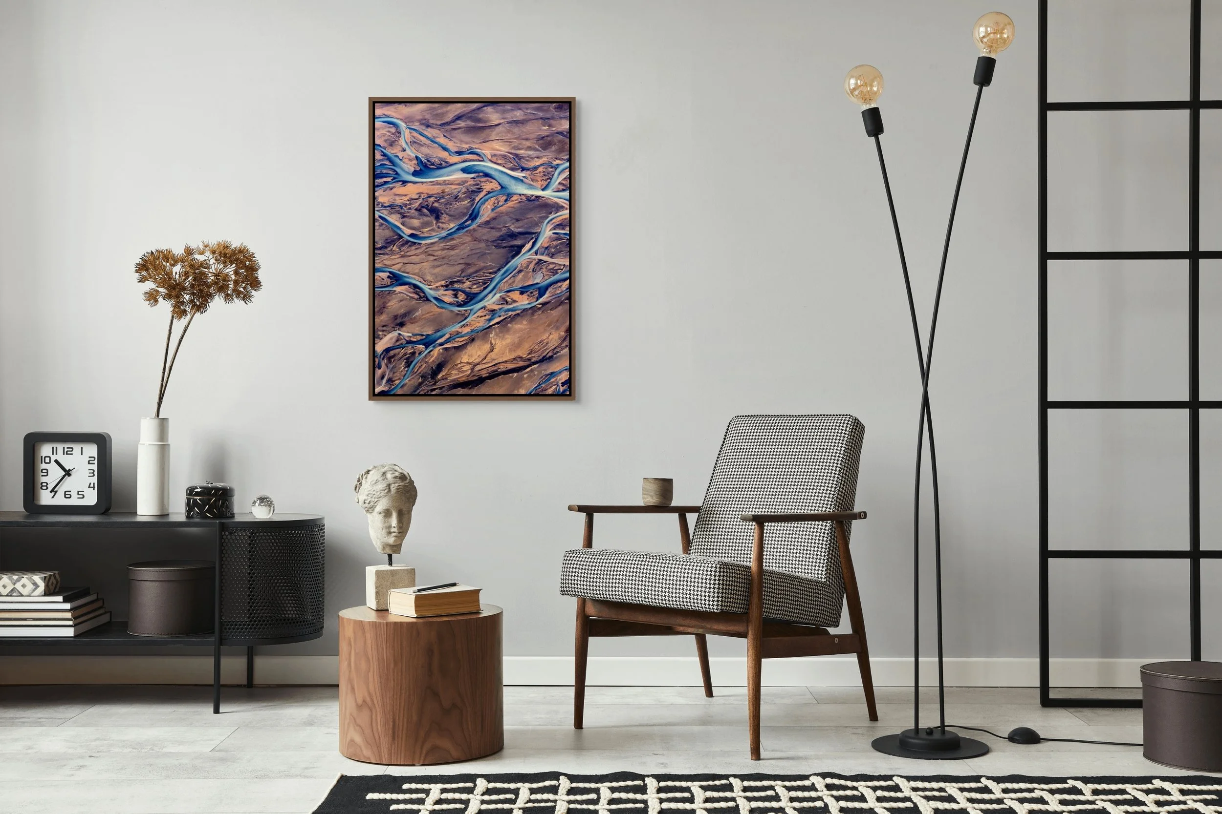 Braided Currents — framed in walnut floating wood frame in a minimalist studio corner with ladder lamp