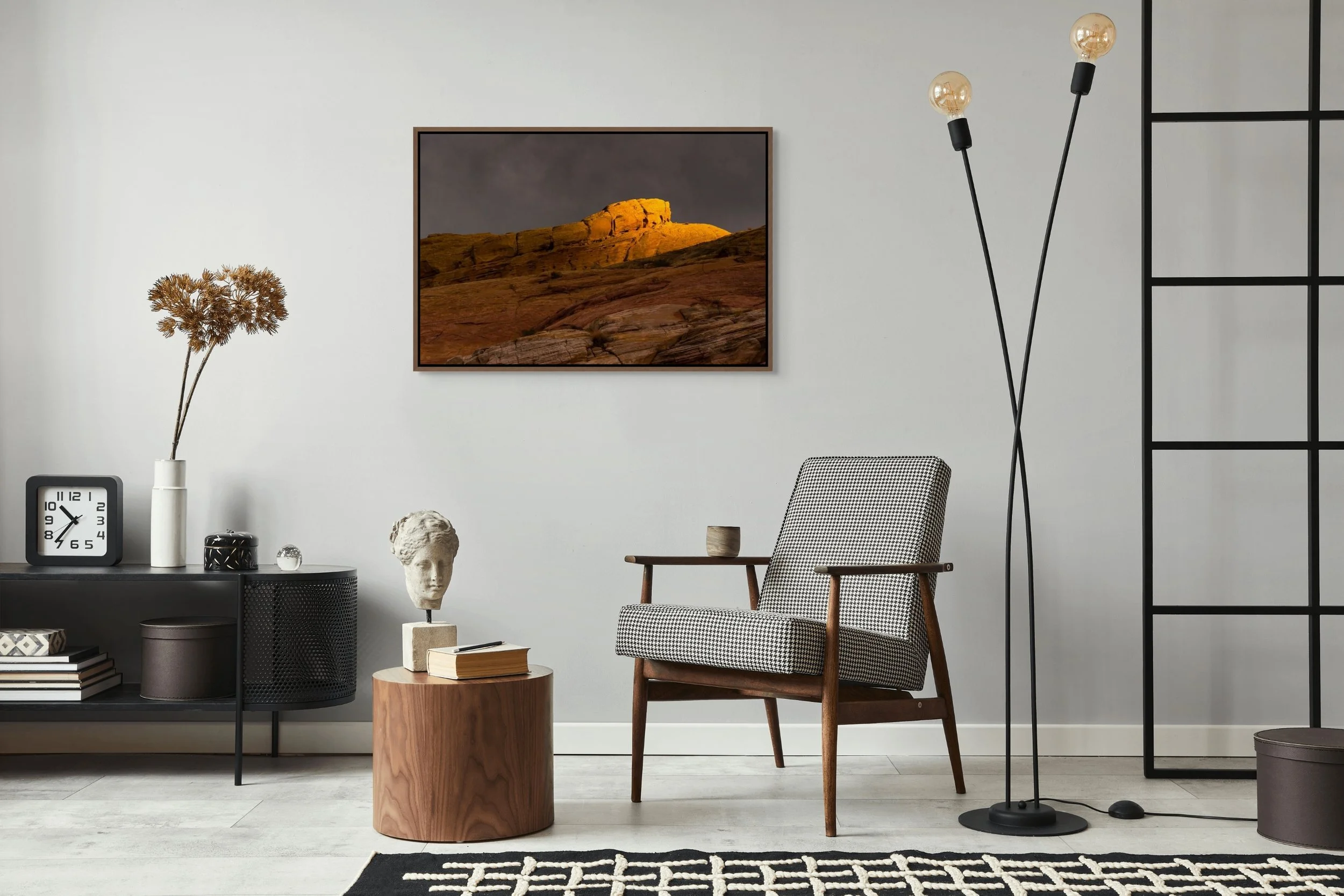 Where Light Lingers, floating Walnut frame, styled with a chair, ladder lamp, and sculptural accents against a neutral wall.