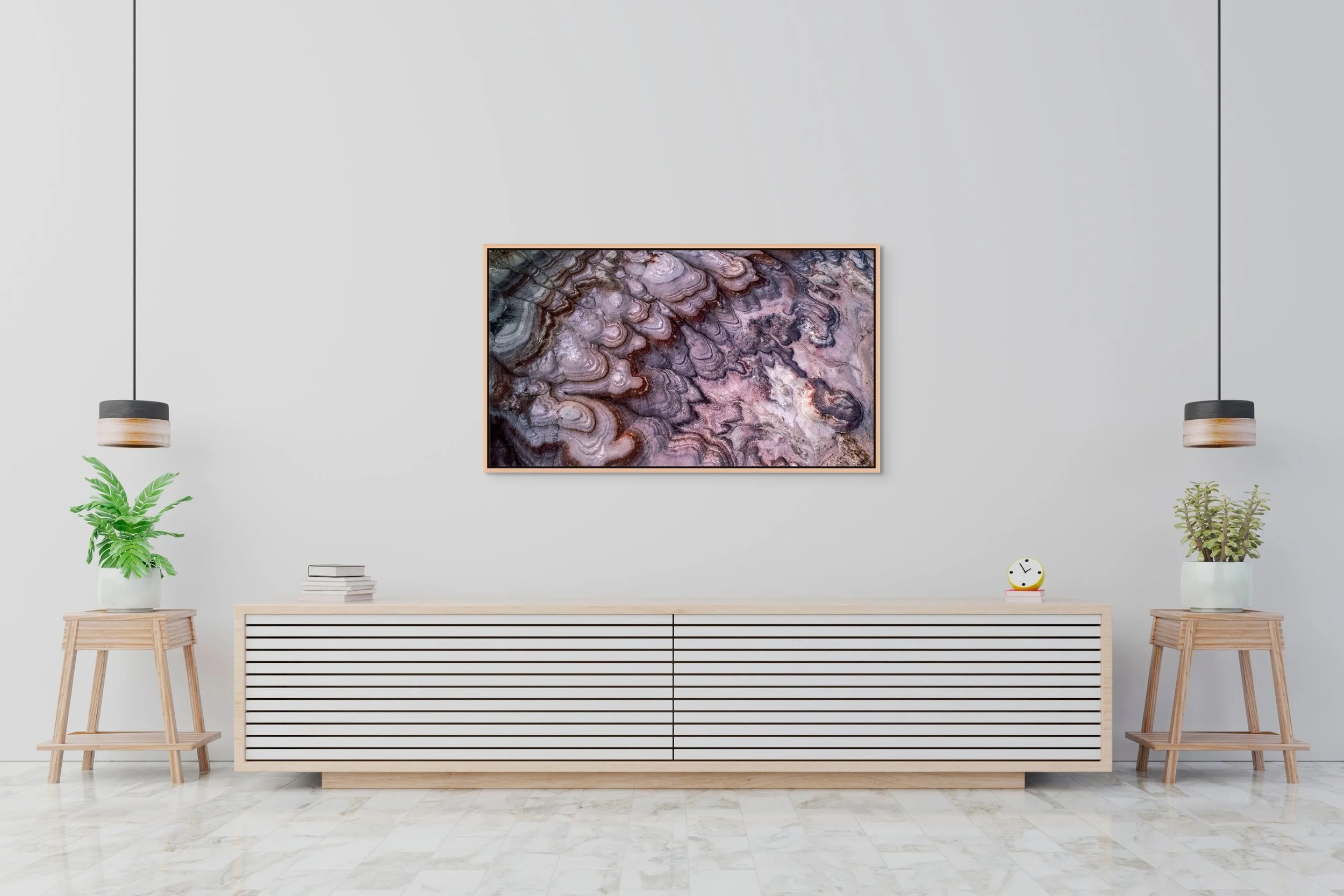 Layers of Time framed in floating wood — oak; bright, minimalist wall with long white console and light wood accents.