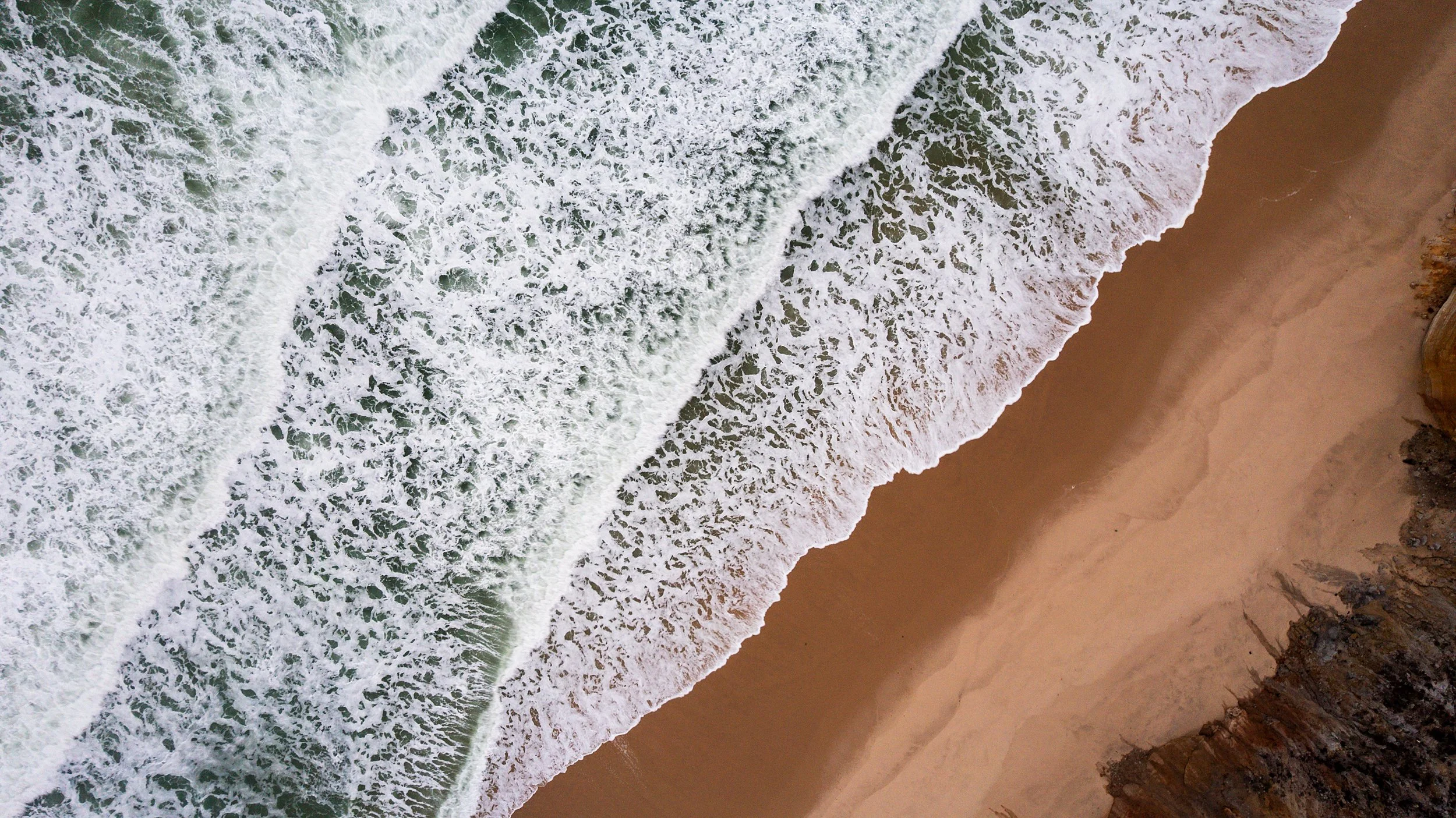 Praia da Areia Branca, Portugal
