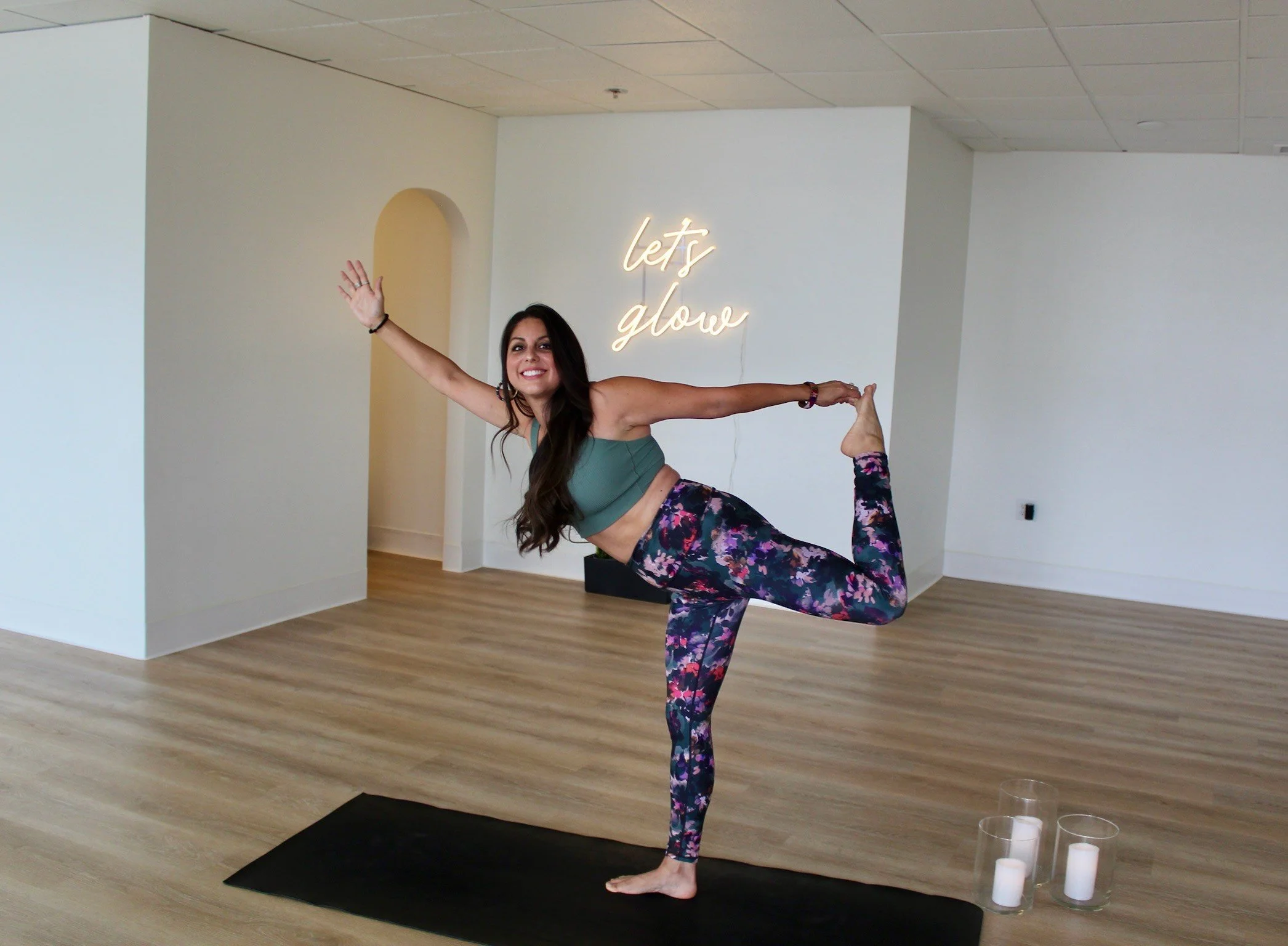 Photo of a Latina yoga instructor in a yoga pose in Eugene, Oregon