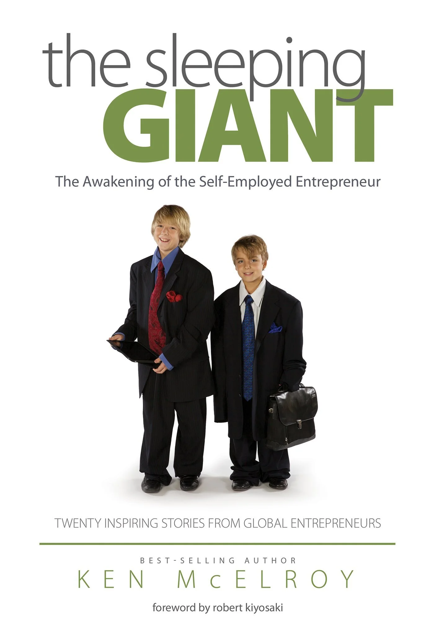 Cover of the book "The Sleeping Giant" showing two young boys in business suits holding briefcases and tablets, standing against a white background.