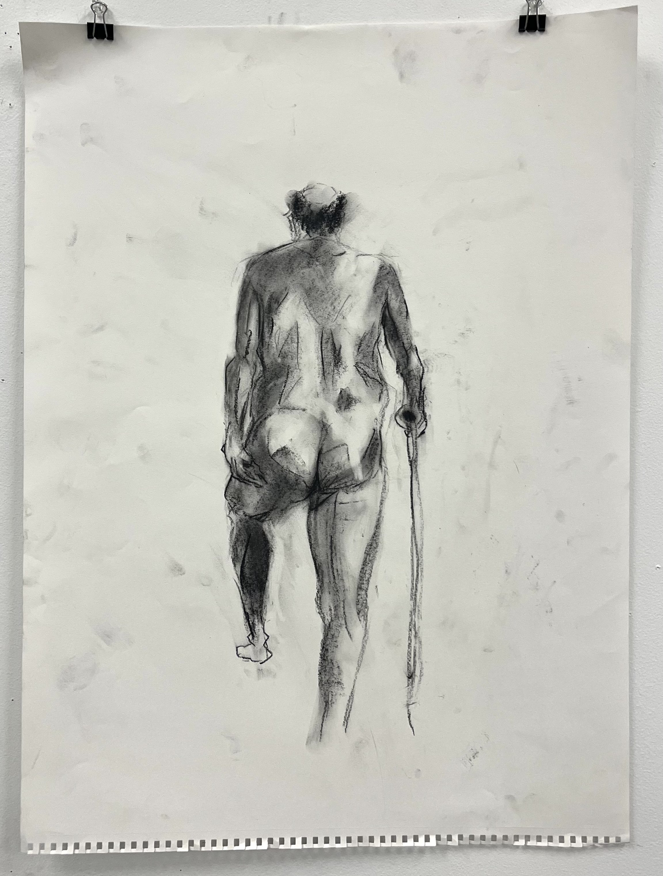 A black and white nude sketch of a person with a cane, shown from the back, walking away.
