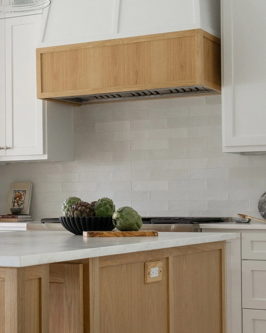 Classic and clean was the goal for this kitchen design. Timeless finishes meet subtle statement pieces, resulting in a space that will feel just as beautiful years from now as it does today. 

What timeless detail do you think every kitchen should ha