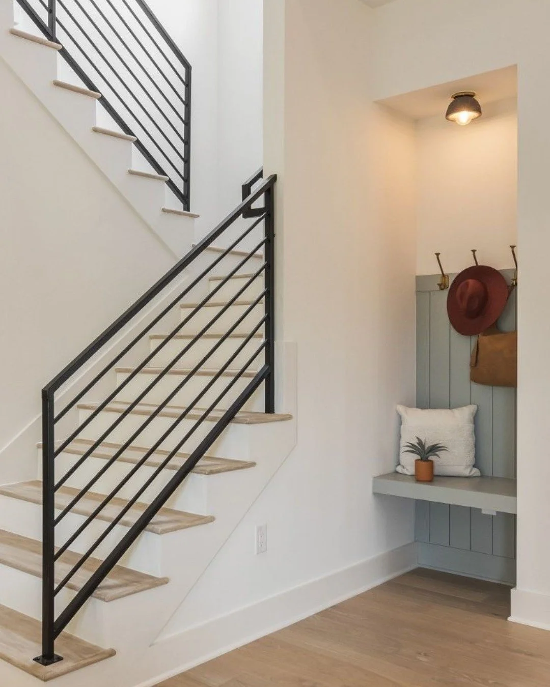Fun fact: this was originally supposed to be a coat closet. We voted &ldquo;bench nook&rdquo; instead for better everyday use. A splash of color, simple storage, a cozy light, and a charming spot to sit and put your shoes on. No regrets.

Contractor: