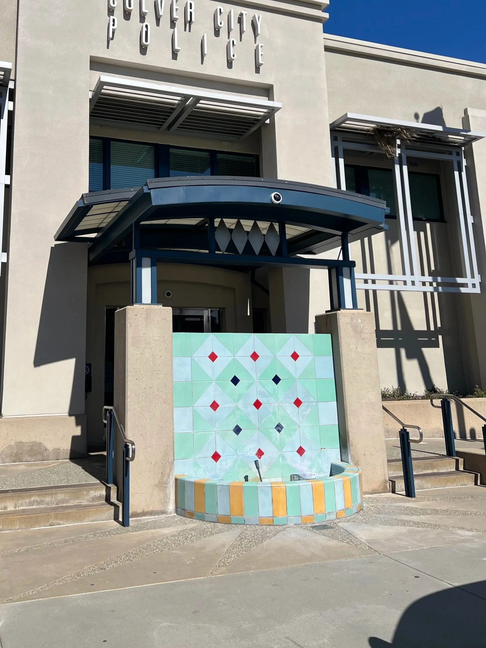 Tile Fountain restoration in front of a municipal building.