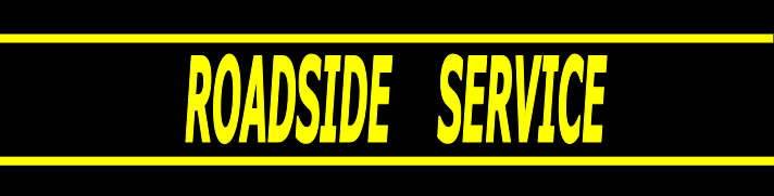 Sign with yellow background and black text reading 'Roadside Service'.