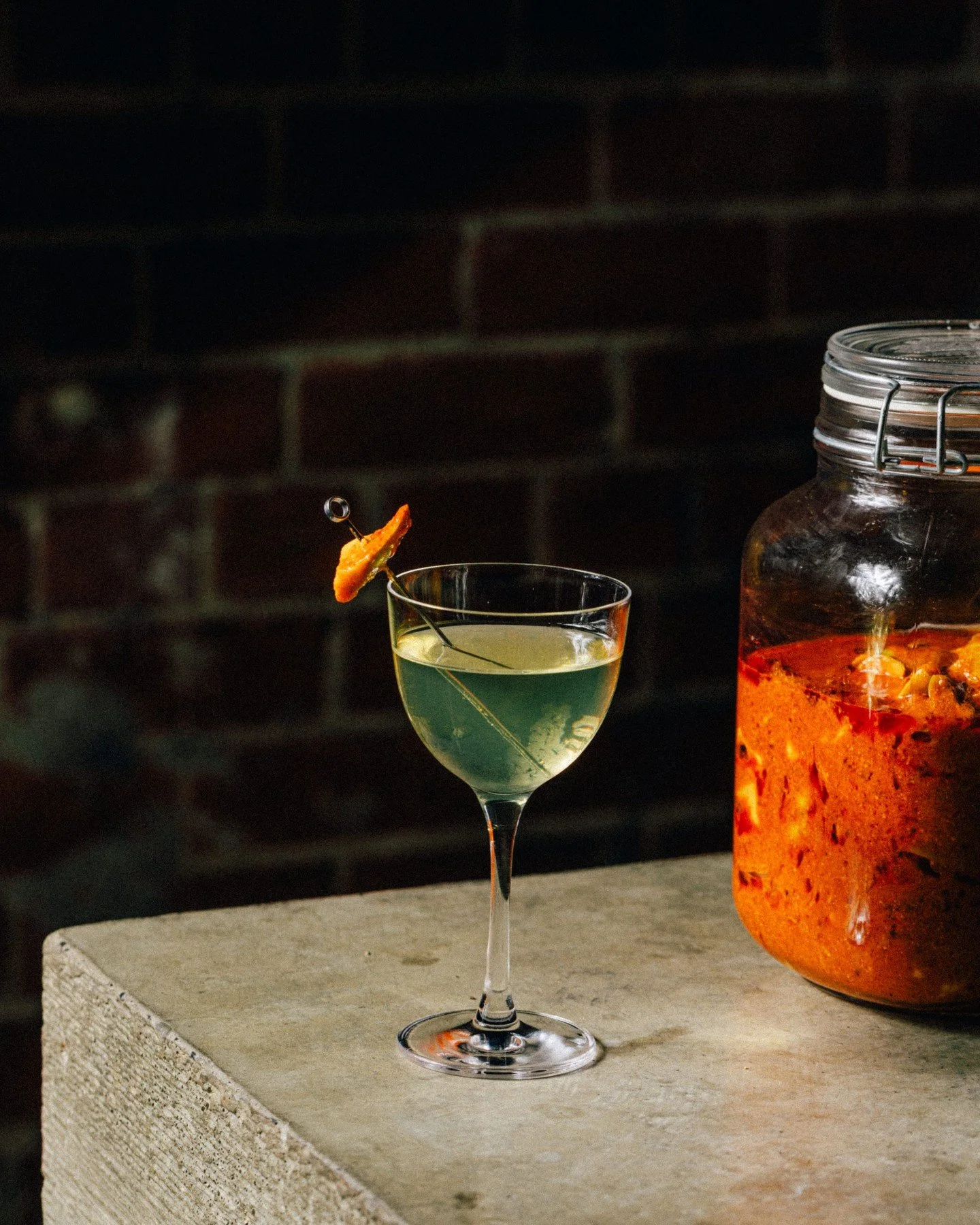 Mango Achaar Martini &mdash; Inspired by memories of eating pickled mangoes while drinking back in India, we&rsquo;ve created our own take on a Martini using house-made green mango achaar, Seven Seasons Native Yam Vodka (crafted from wild-harvested n