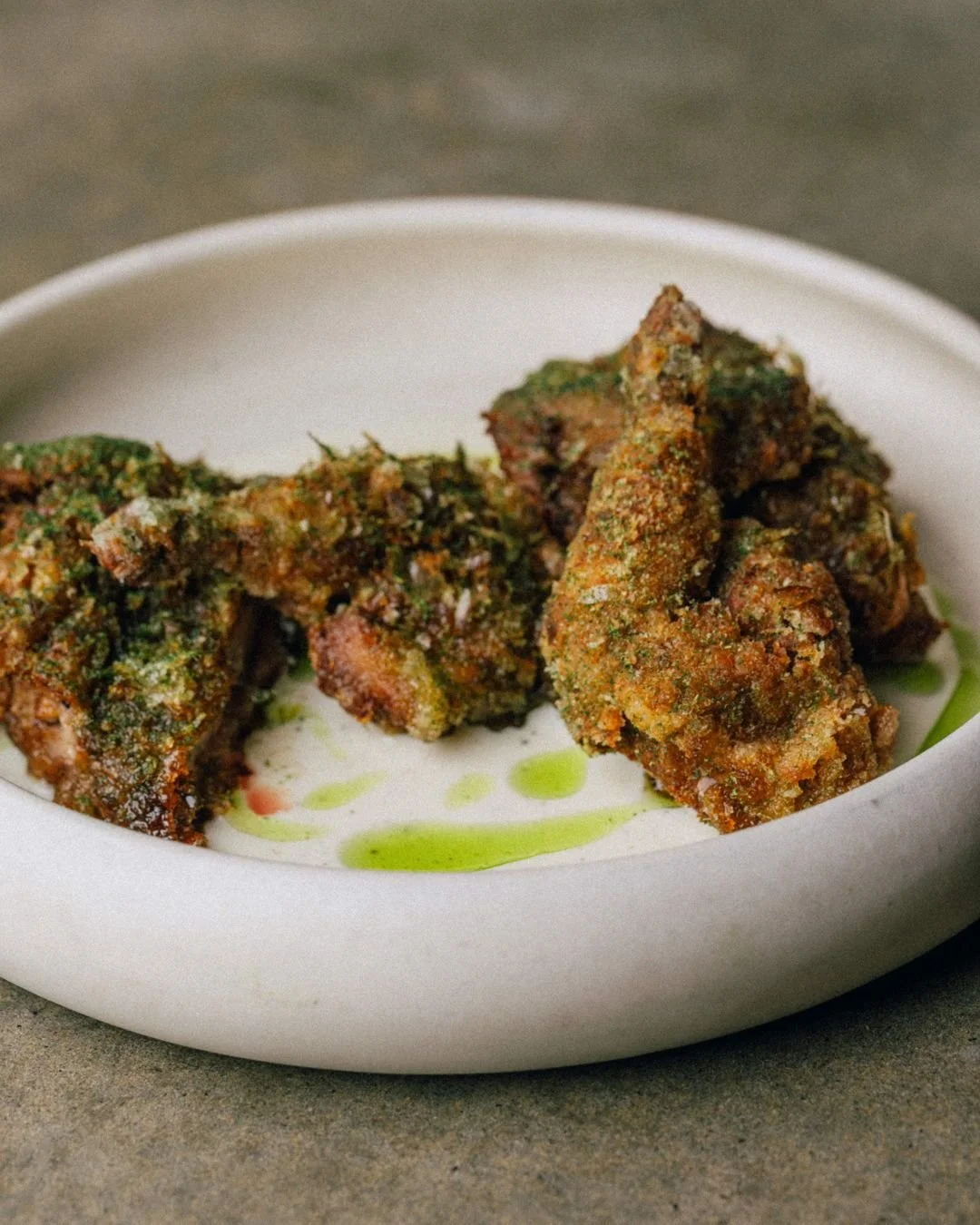 Kaadai Fry &mdash; Crispy Quail, Buttermilk Sauce, Curry Leaf

Crispy quail the SAADI way: crunchy skin, succulent meat, finger-licking sauce and seasoning in every crevice and crackling. Not too shabby with a very cold beer. Lucky we&rsquo;ve got bo