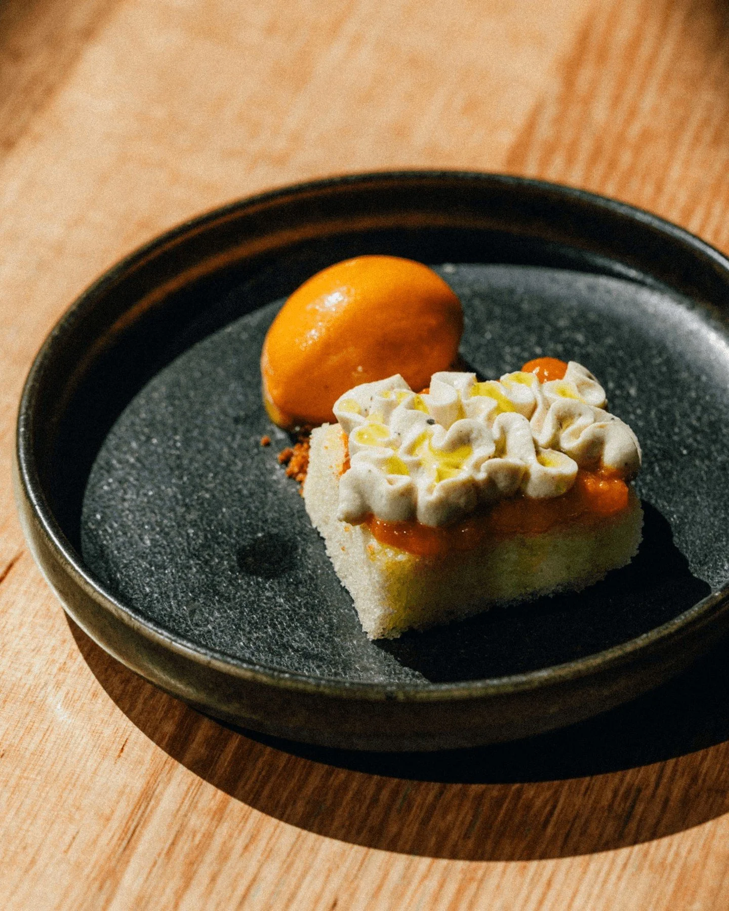 Qubani ka meetha translates to &ldquo;apricot sweet&rdquo; and that pretty much summarises this dessert.

Traditionally, dried apricots are stewed in water with sugar until they reach a jammy consistency, then served with cream and garnished with alm
