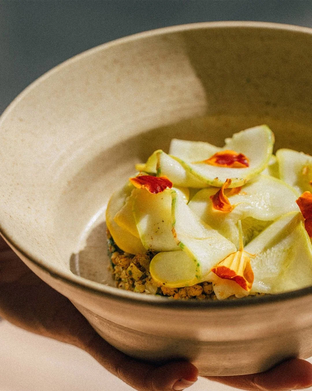 Middle course - summer squash, parippu usili, curry leaf podi. Parippu usili adds a humble, crumbly lentil texture, a staple on our menu for lunch and dinner.