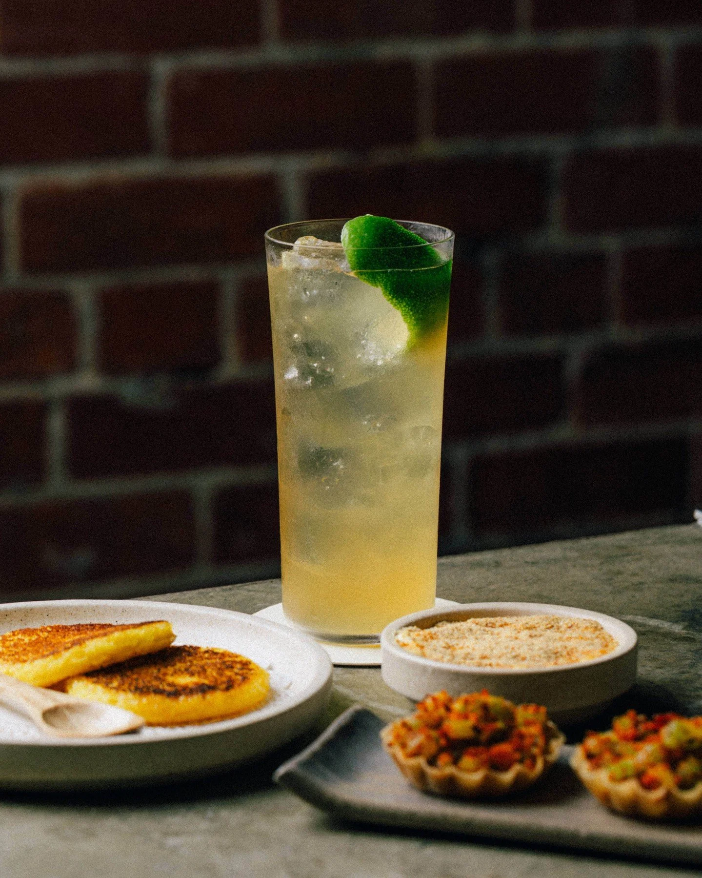 Our lime soda is a drink you reach for when the weather can&rsquo;t make up its mind. Built off our house-preserved lime, it is blended with a dark, herbal Alpine Amaro and rounded off with @thegospelwhiskey solera rye whiskey and finished with a hin