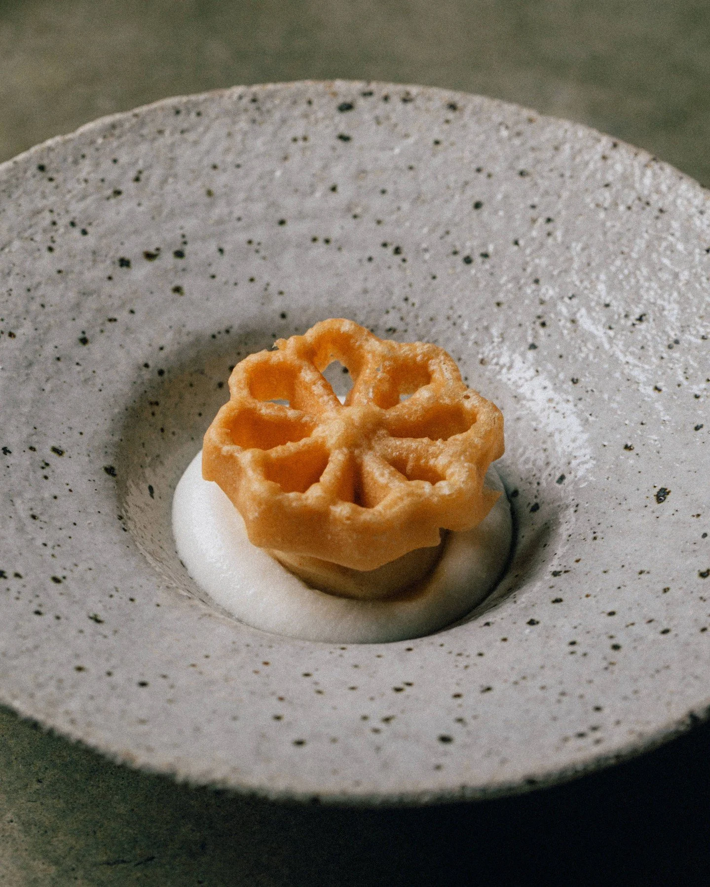 Achappam &mdash; rose cookie, fig jam, brown butter sorbet, coconut mousse

Achappams are crunchy, flower-shaped biscuits, which is how they get their name. Crack the cookie with the back of your spoon and make sure you scoop all the way to the botto