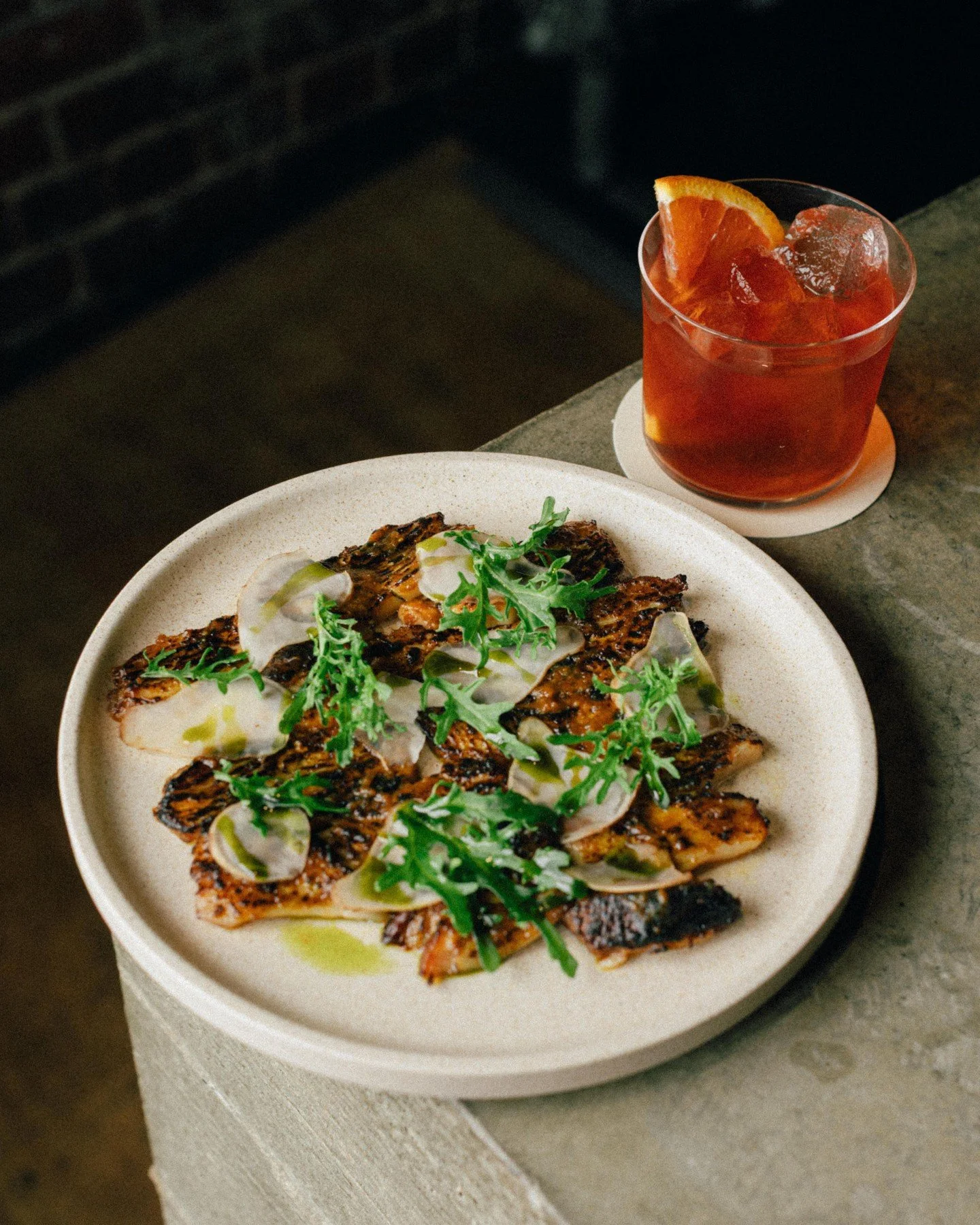 BBQ pork jowl, inji pulli + Non Negroni

Pork jowl is gently braised, pressed overnight, glossed with an inji pulli condiment of ginger and tamarind and finished on the barbecue. 

Pair it with our alcohol-free negroni made with our strawberry and ja
