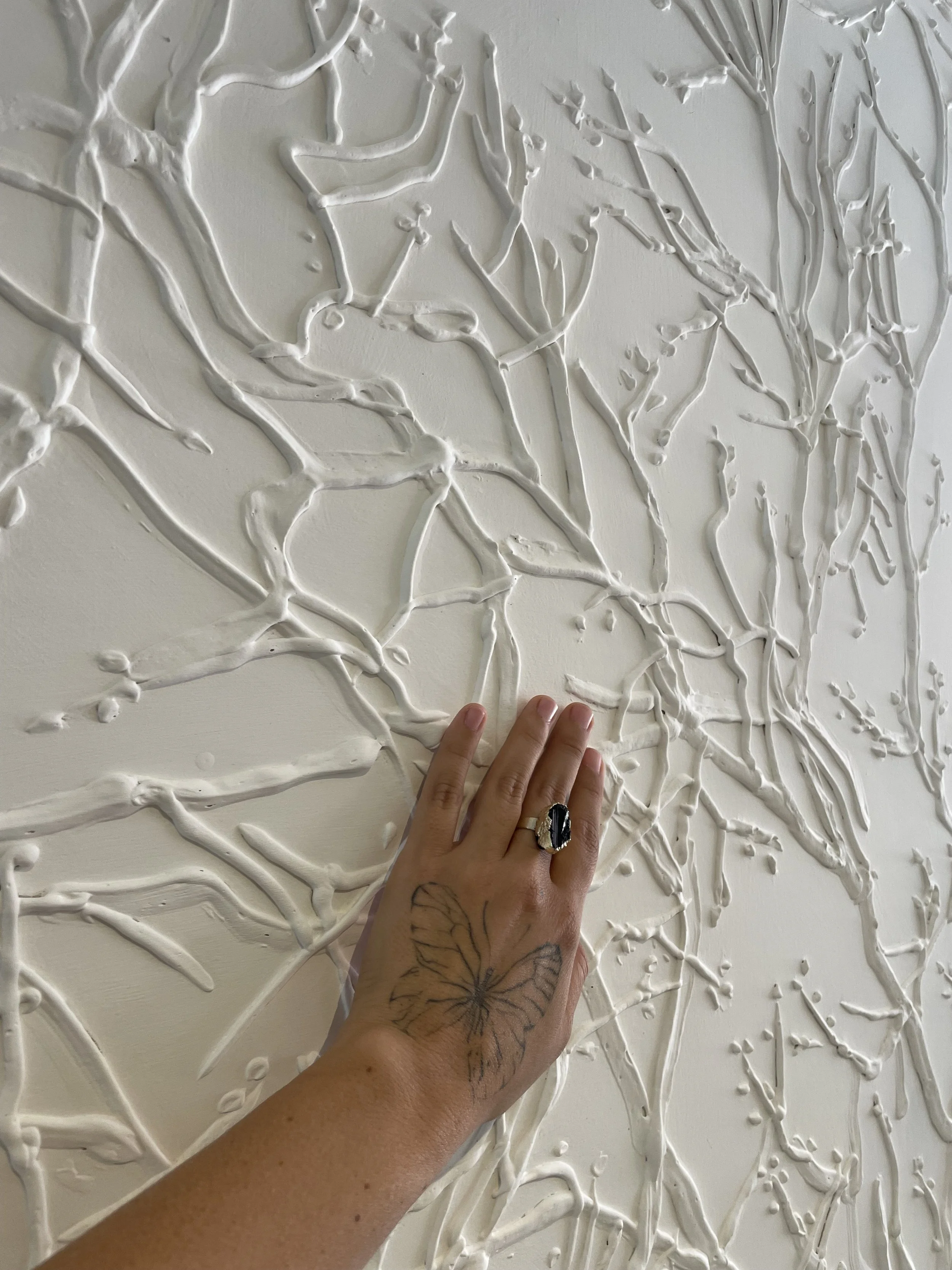 paloma-rocha-cycles-tree-branches-relief-sculpture.jpg