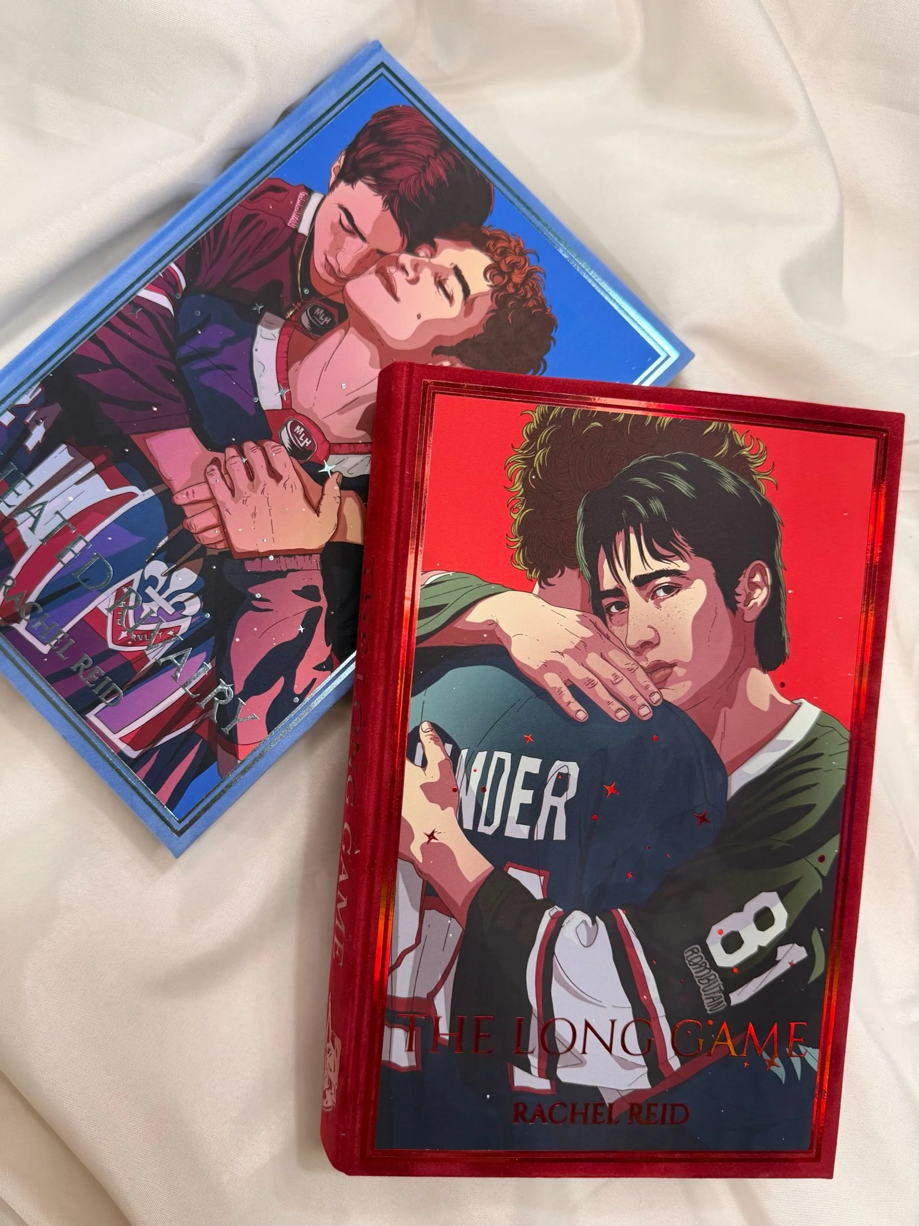 Heated Rivalry and The Long Game by Rachel Reid with art by Rombutan