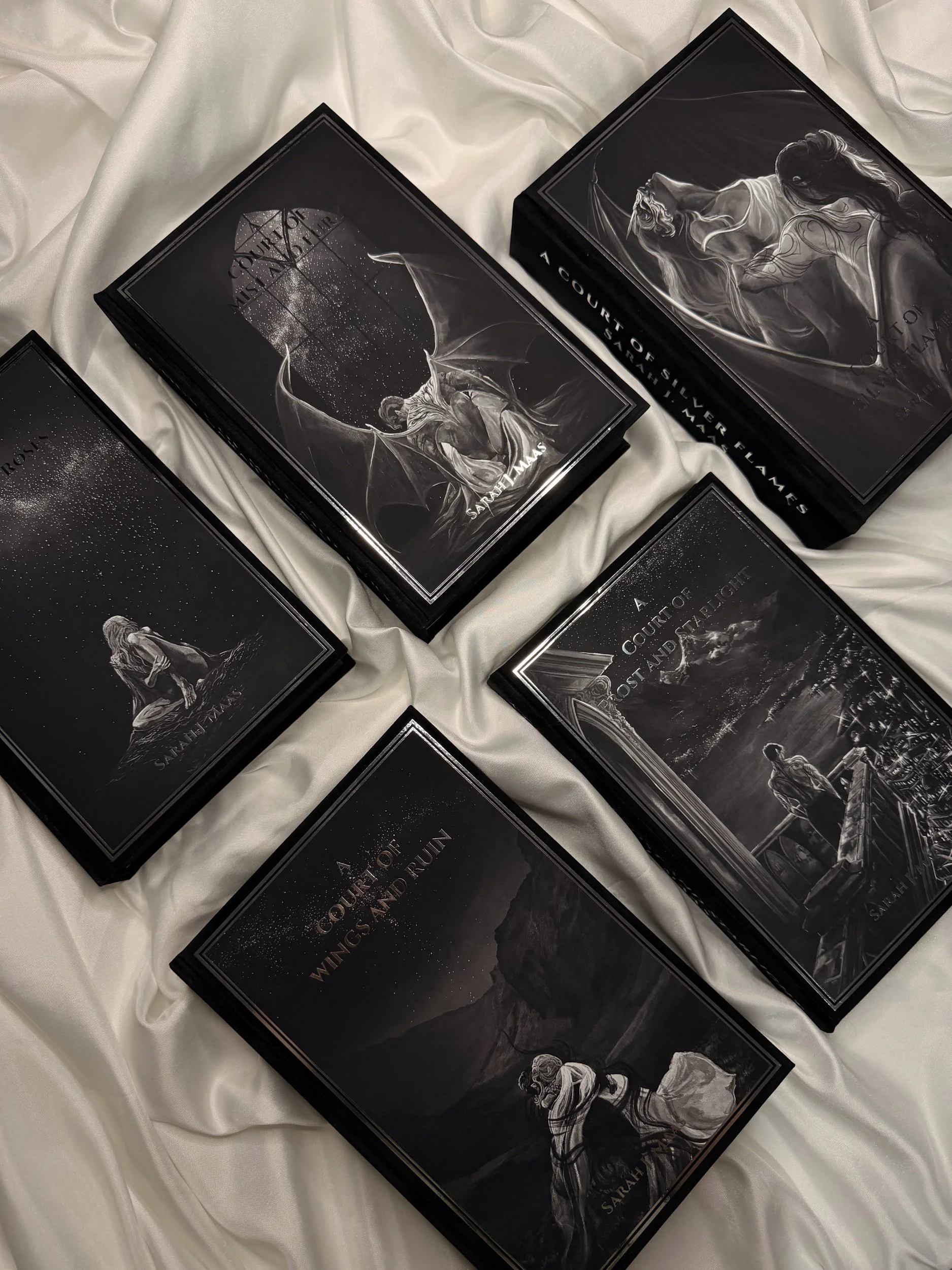 A Court of Thorns and Roses Series by Sarah J Maas with art by Olivia Rose James