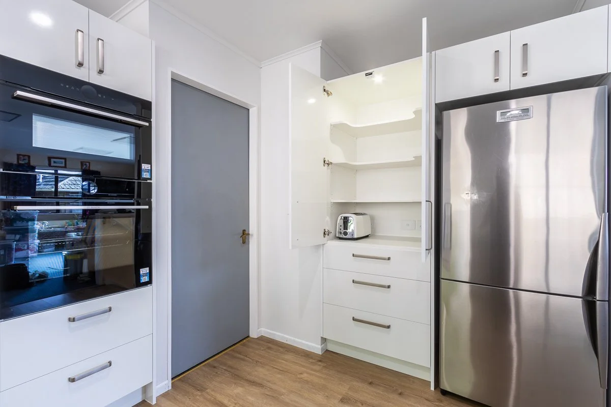 Close Detail of Kitchen Appliance Hub Pantry, Oven Appliances