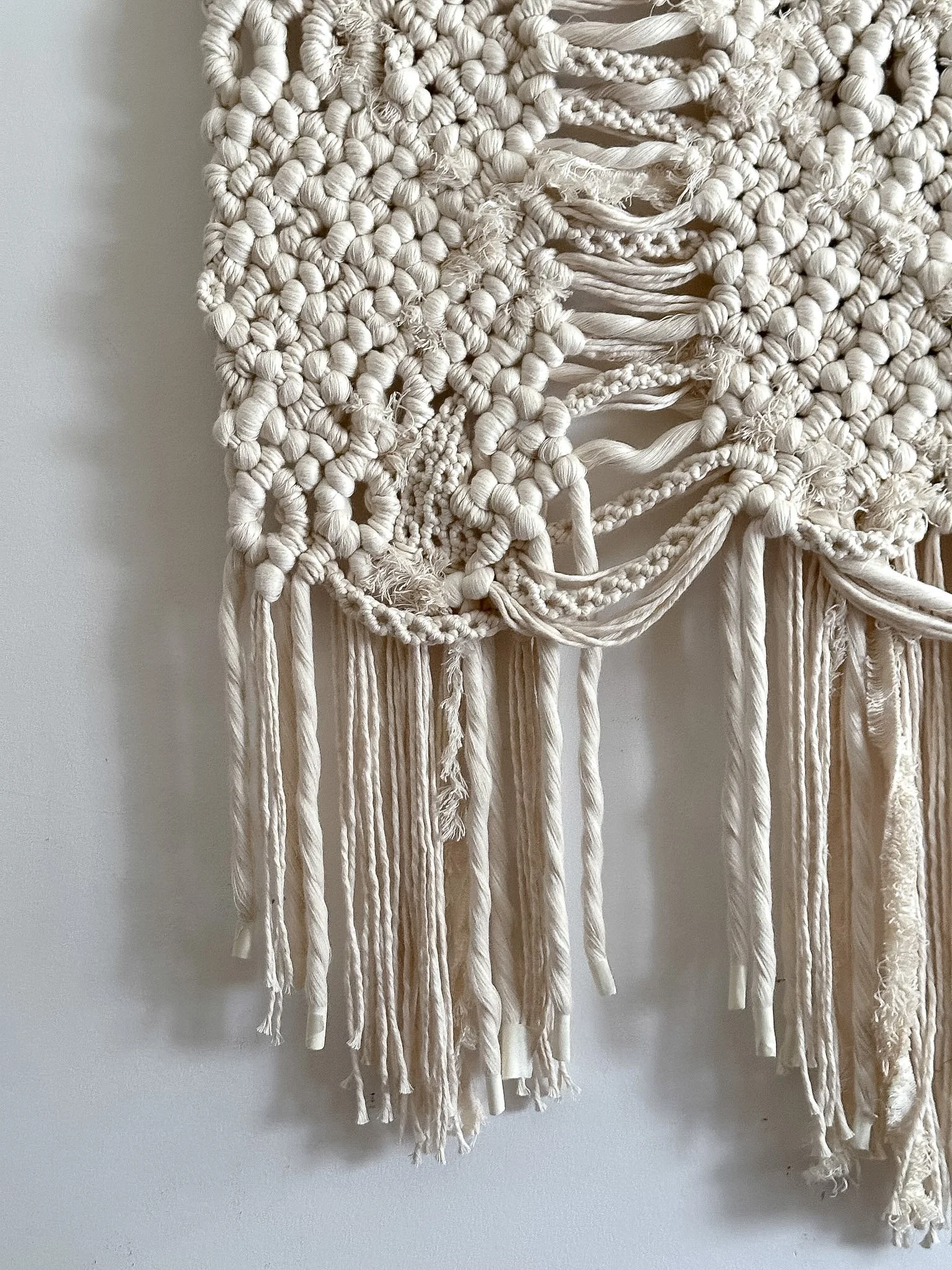 Close up of fringe detail in bespoke macrame artwork Hope 004 by textile artist Ana Salazar.jpg