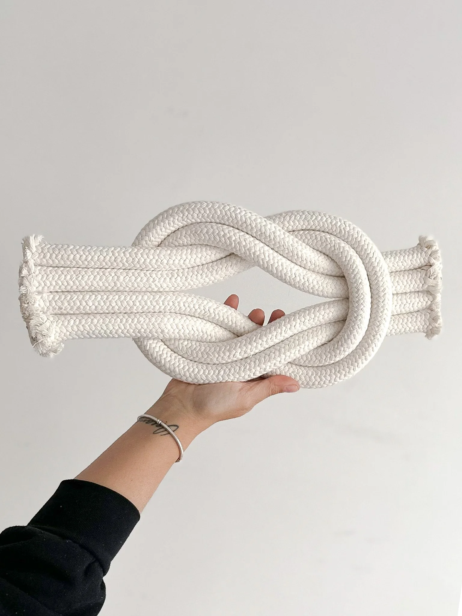 large reef knot textile sculpture in natural braided cotton rope | Ana Salazar Atelier