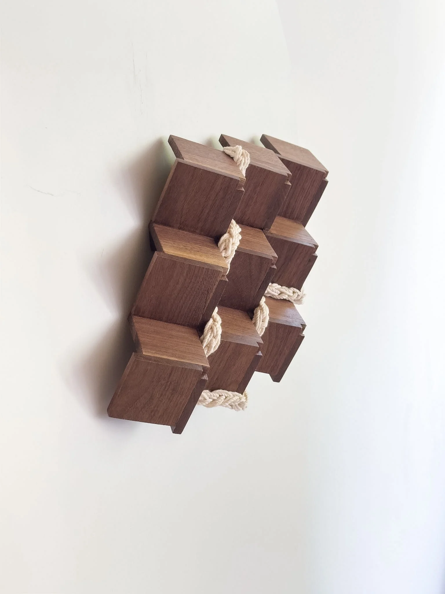 close-up of geometric mixed medium relief | Ana Salazar Atelier.jpg