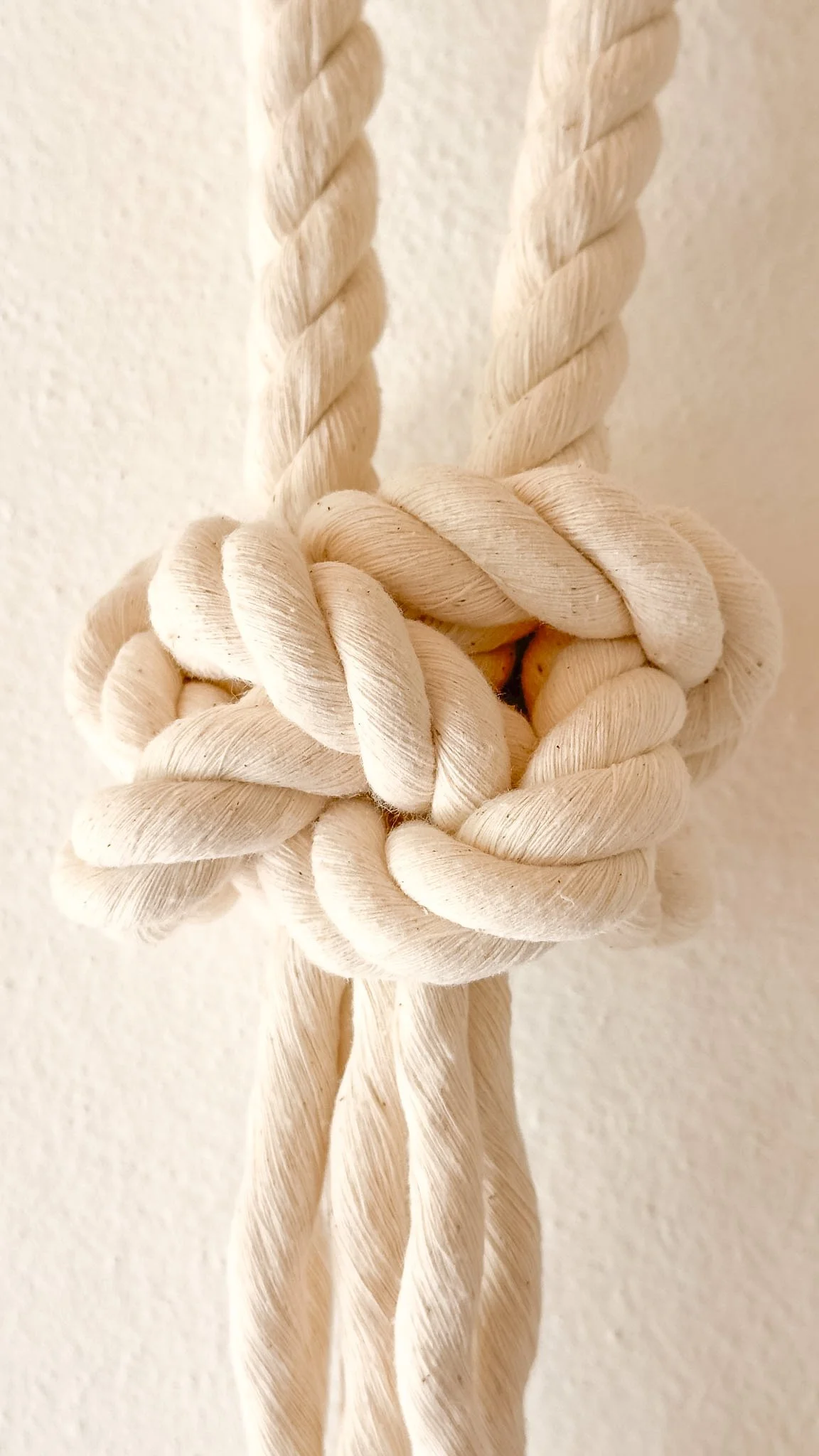 Close-up of large sculptural Chinese Button Tassel knot | Ana Salazar Atelier.JPG