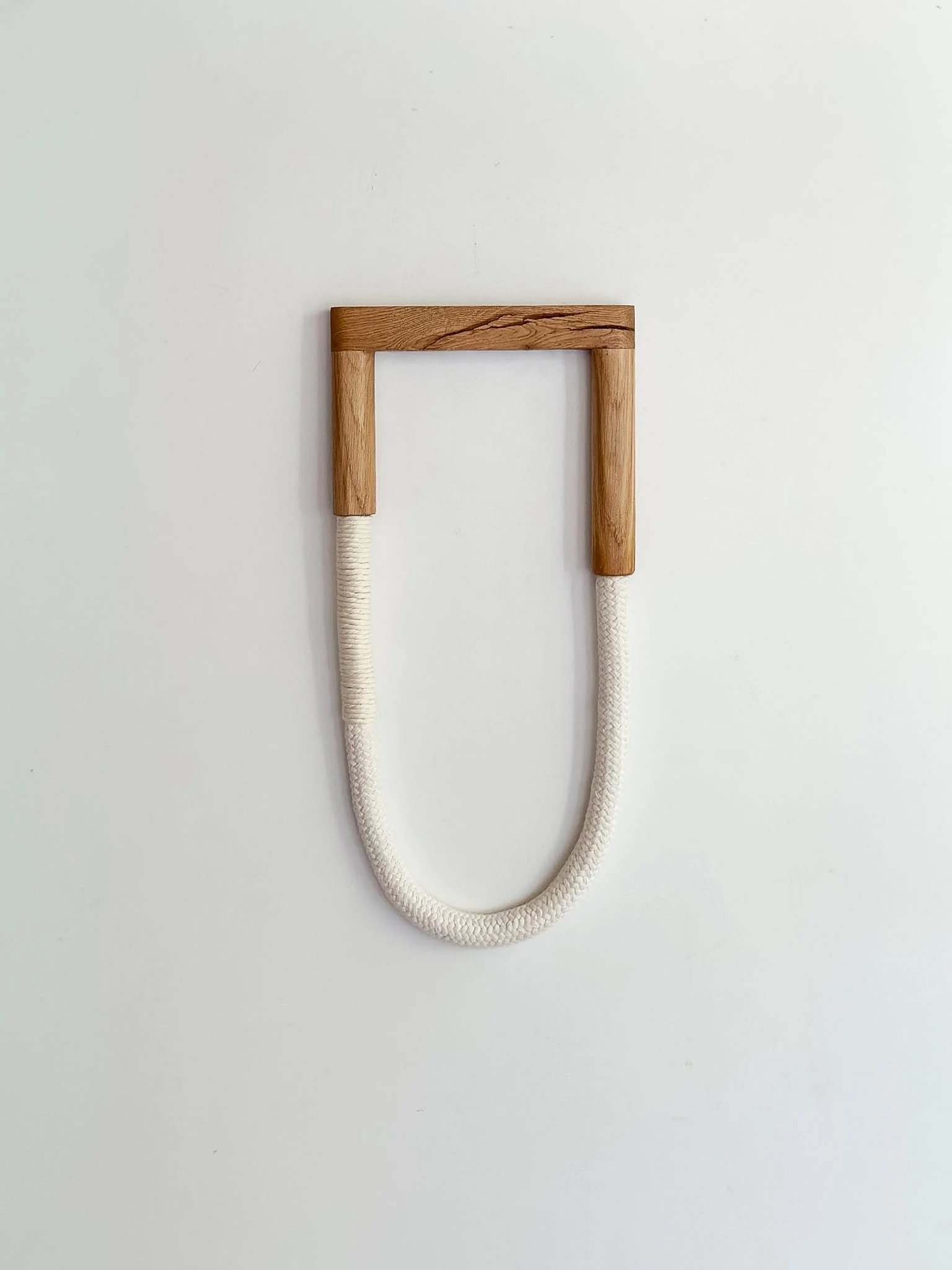minimalist wall sculpture in oak wood with chuncky cotton chain | Link Series | Ana Salazar Atelier.jpg