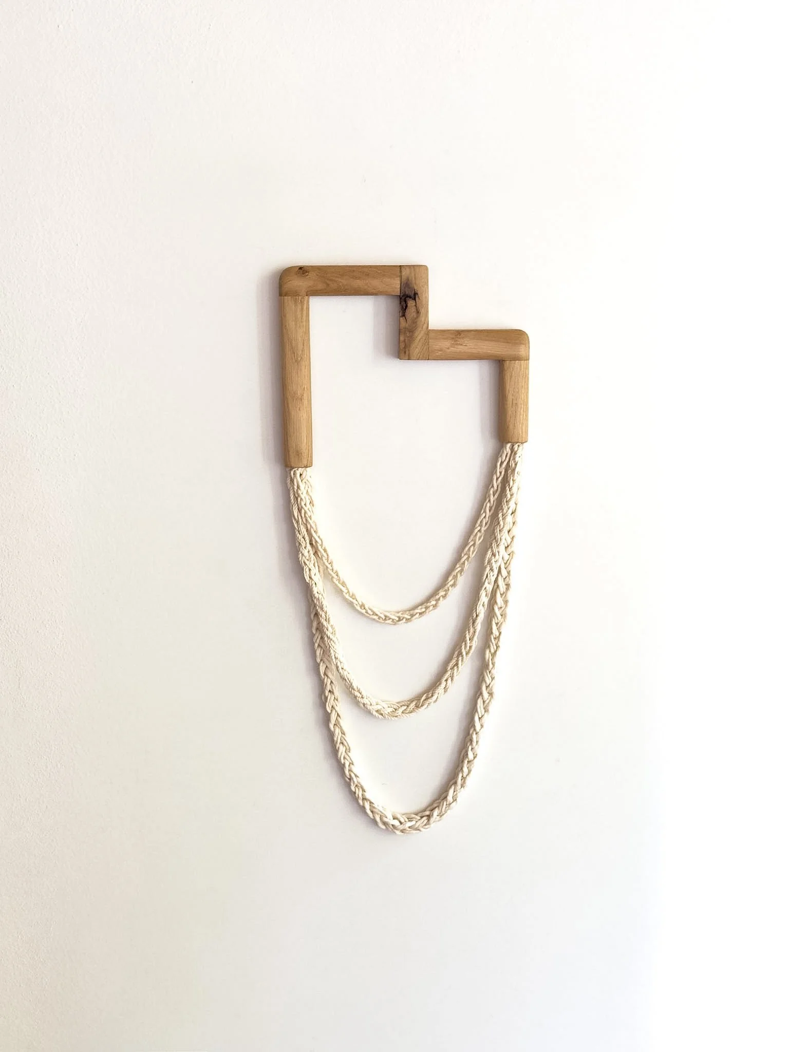 geometric wall sculpture in oak wood with textured cotton chains | Link Series | Ana Salazar Atelier.jpg