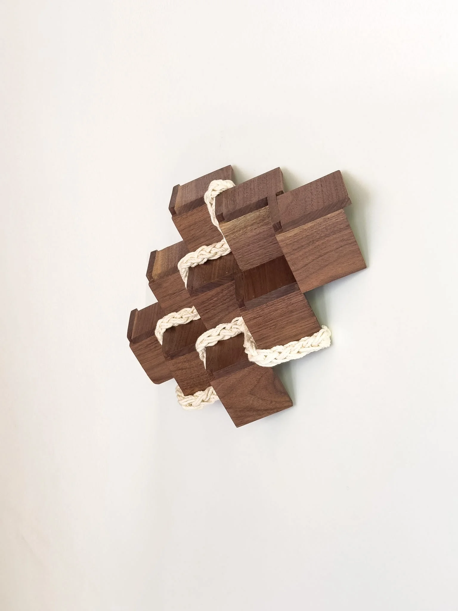 close-up of geometric wood relief | Ana Salazar Atelier.jpg